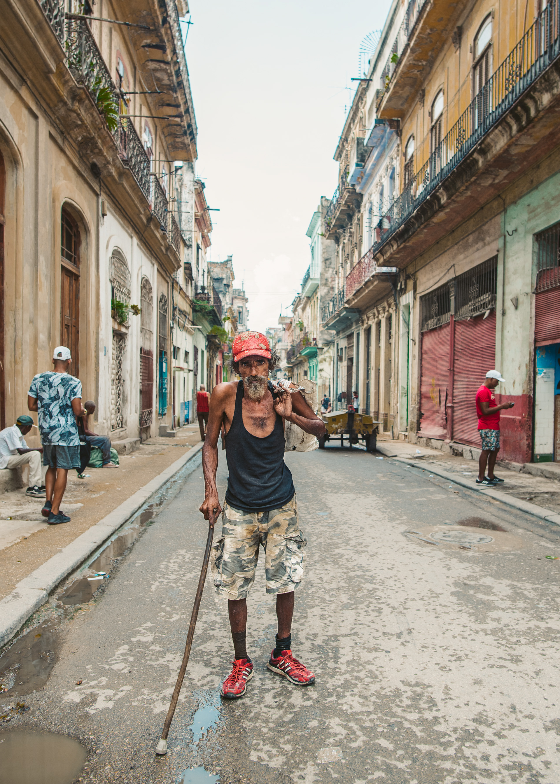 La Habana, Cuba. He stopped in his tracks and looked at my camera as I held it on my side. I brought the camera up and gestured for a shot, he nodded and continued to stand still until I was done. A wordless encounter that spoke volumes.