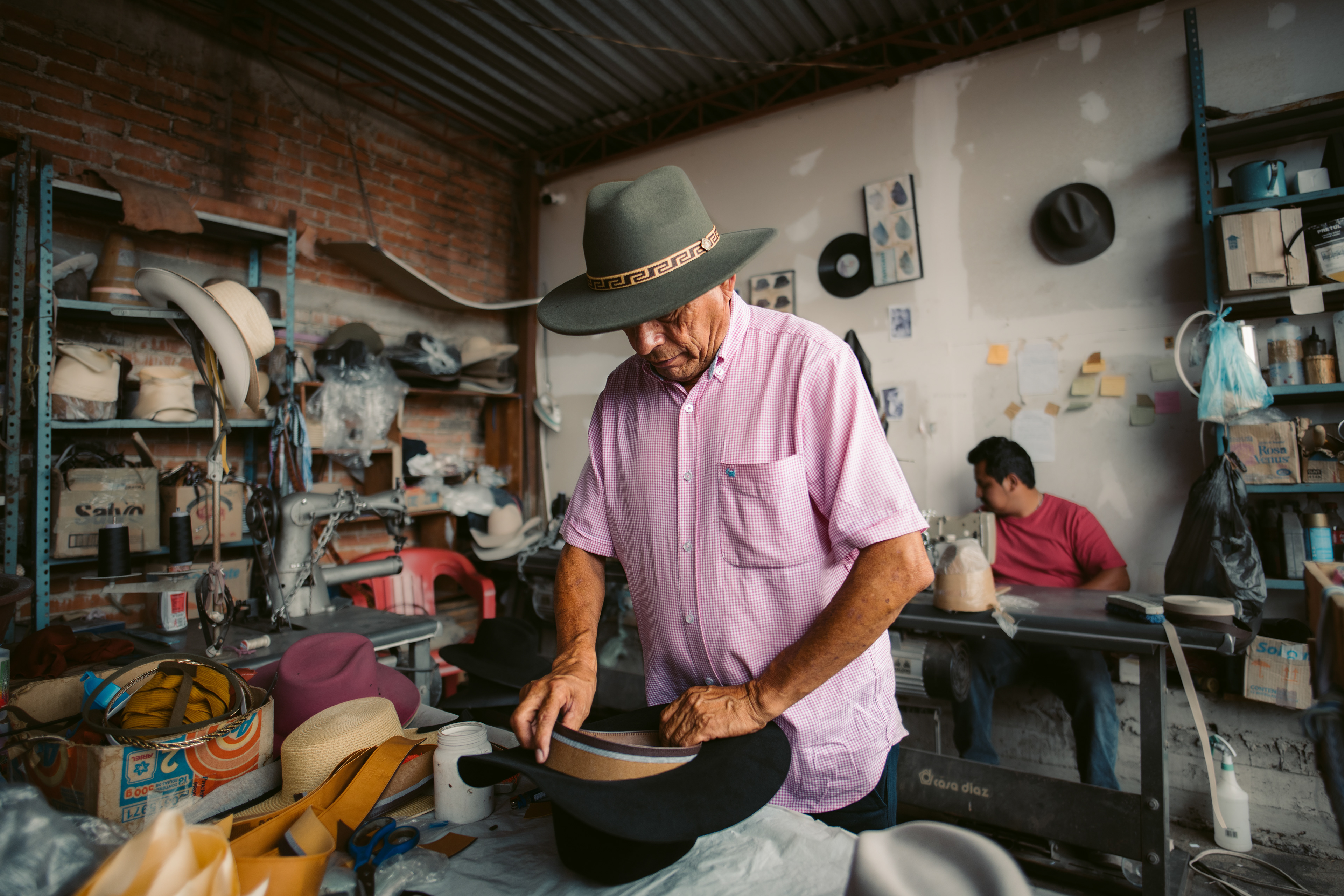 Don Alberto, owner of Sombreros Alberly, showing us the hat-making process