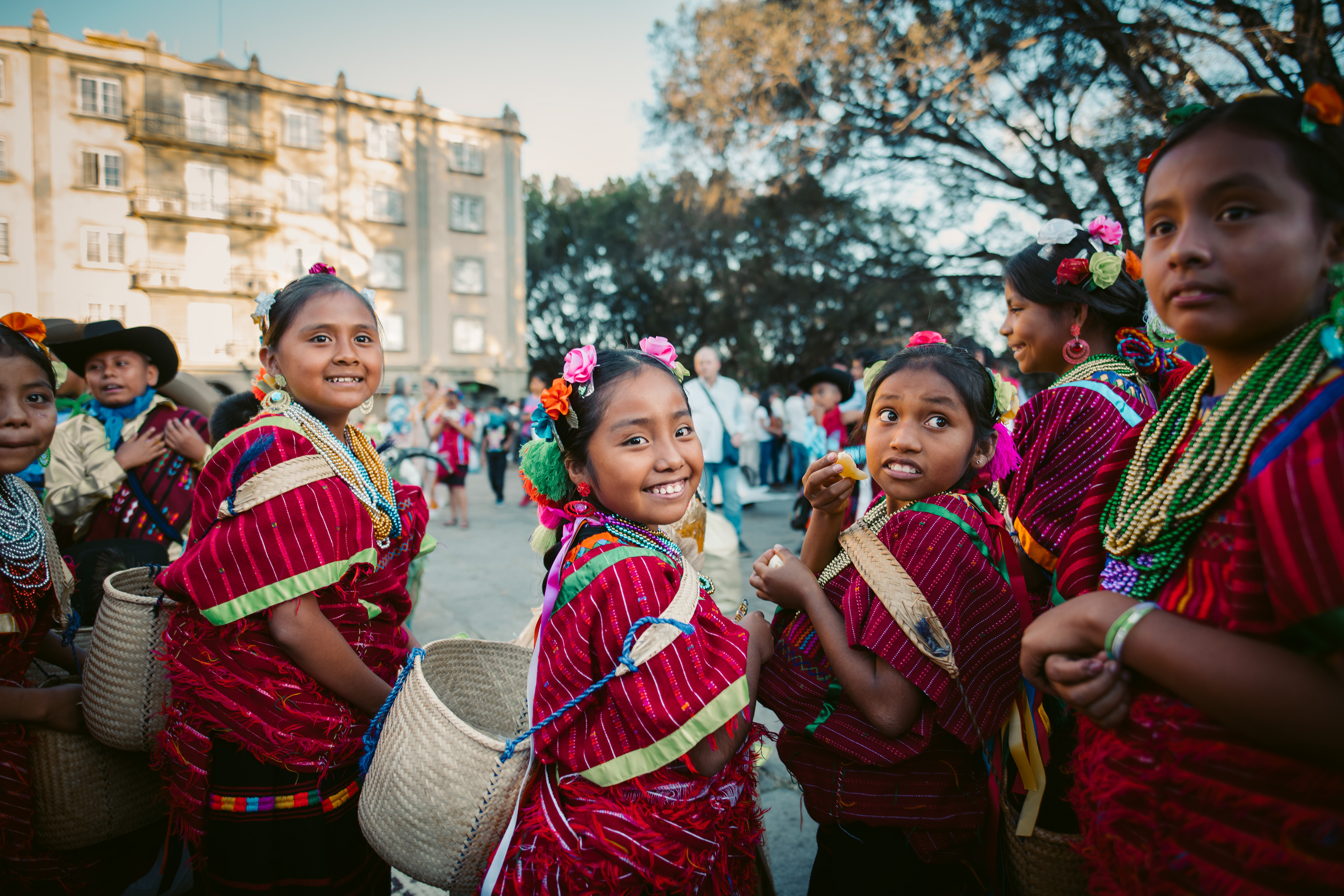 Girls getting ready to perform a traditional Oaxaquen dance for a parade in Oaxaca, Mexico