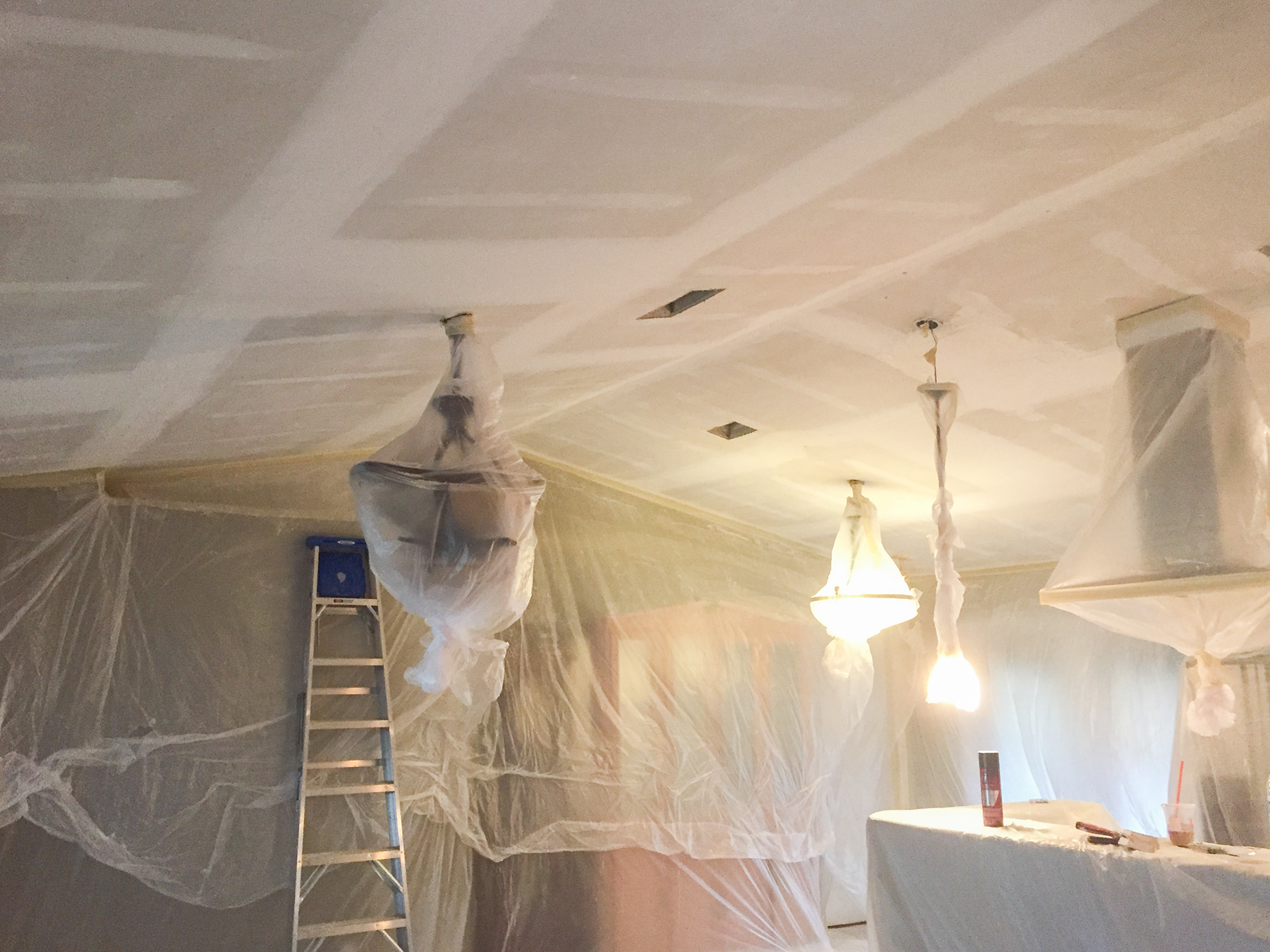 After popcorn removal and seam/damage repair.
