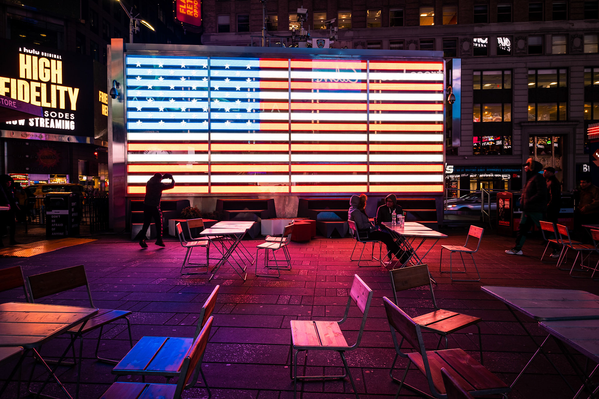 Times Square, is a busy tourist intersection of neon art and commerce and is an iconic street of New York City