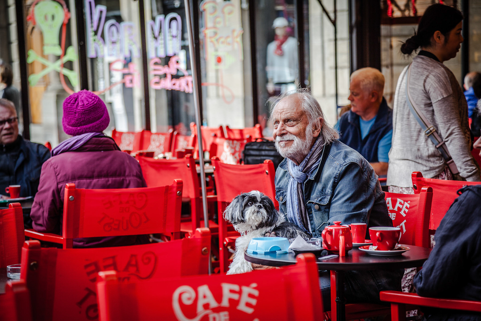People are having lunch at the outdoor restaurant in Saint Malo, Britany, France
