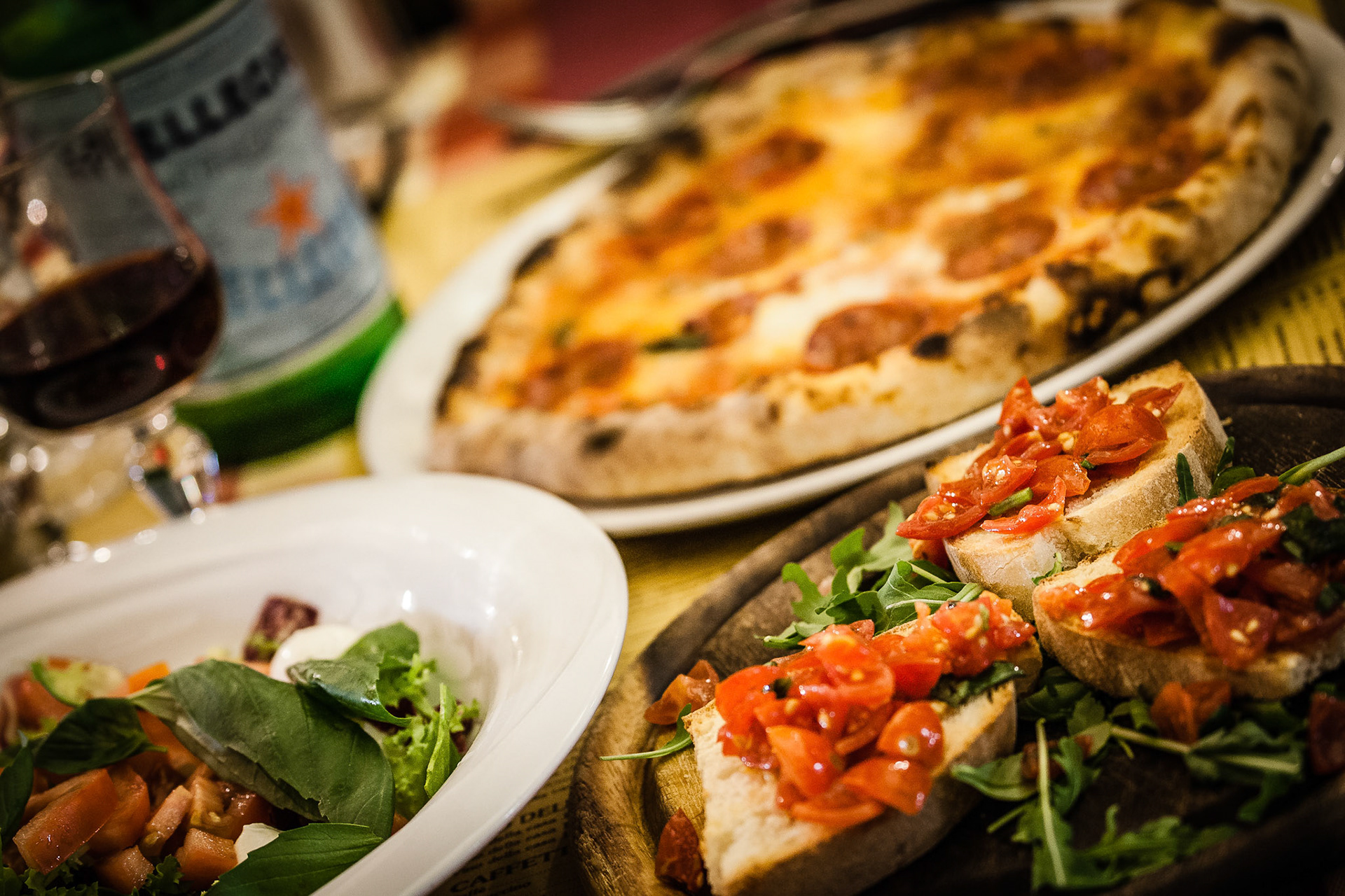 italian bruschetta with fresh tomatoes, basil, garlic, olive oil and cheese