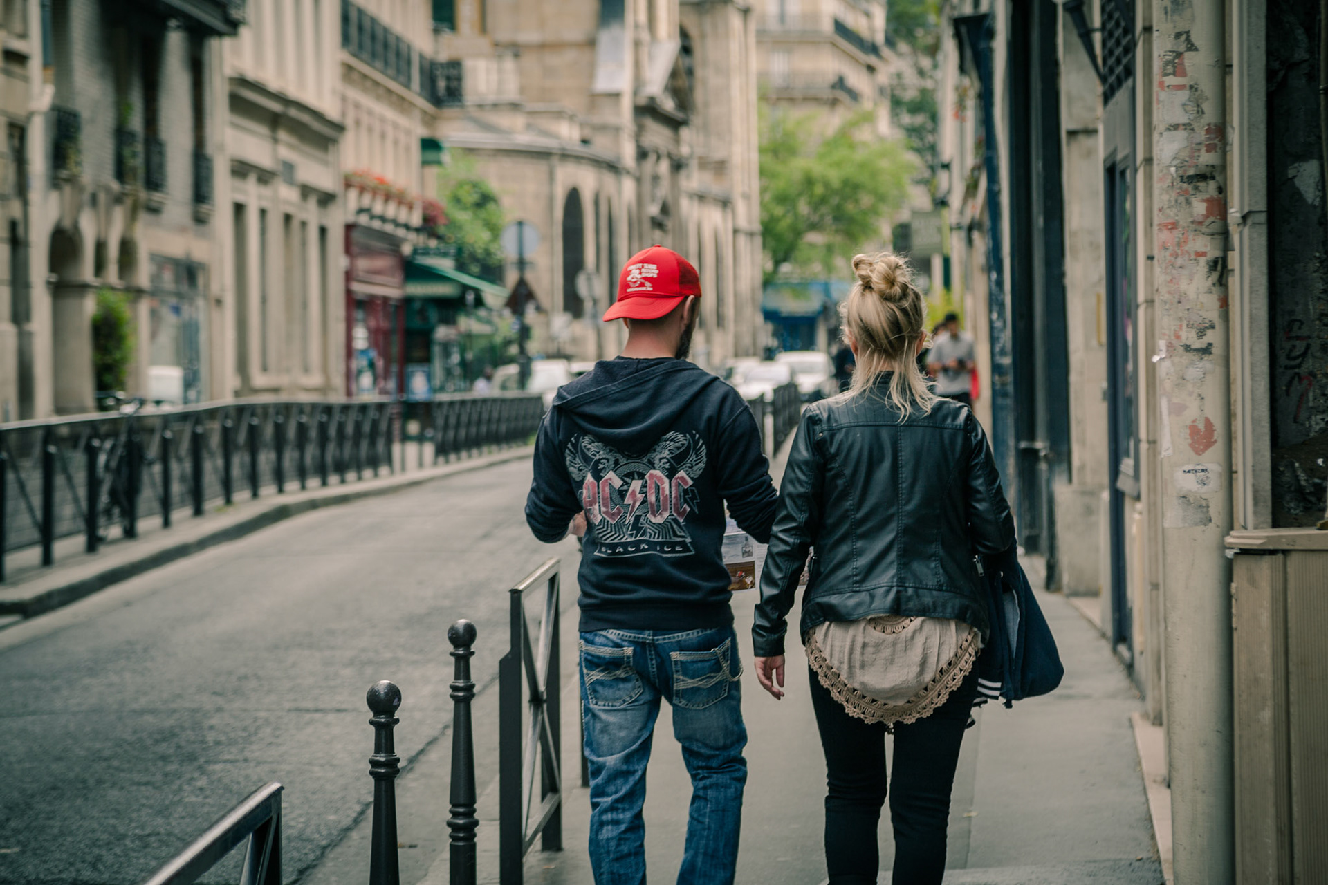 Couple walking in the streets of Paris, France