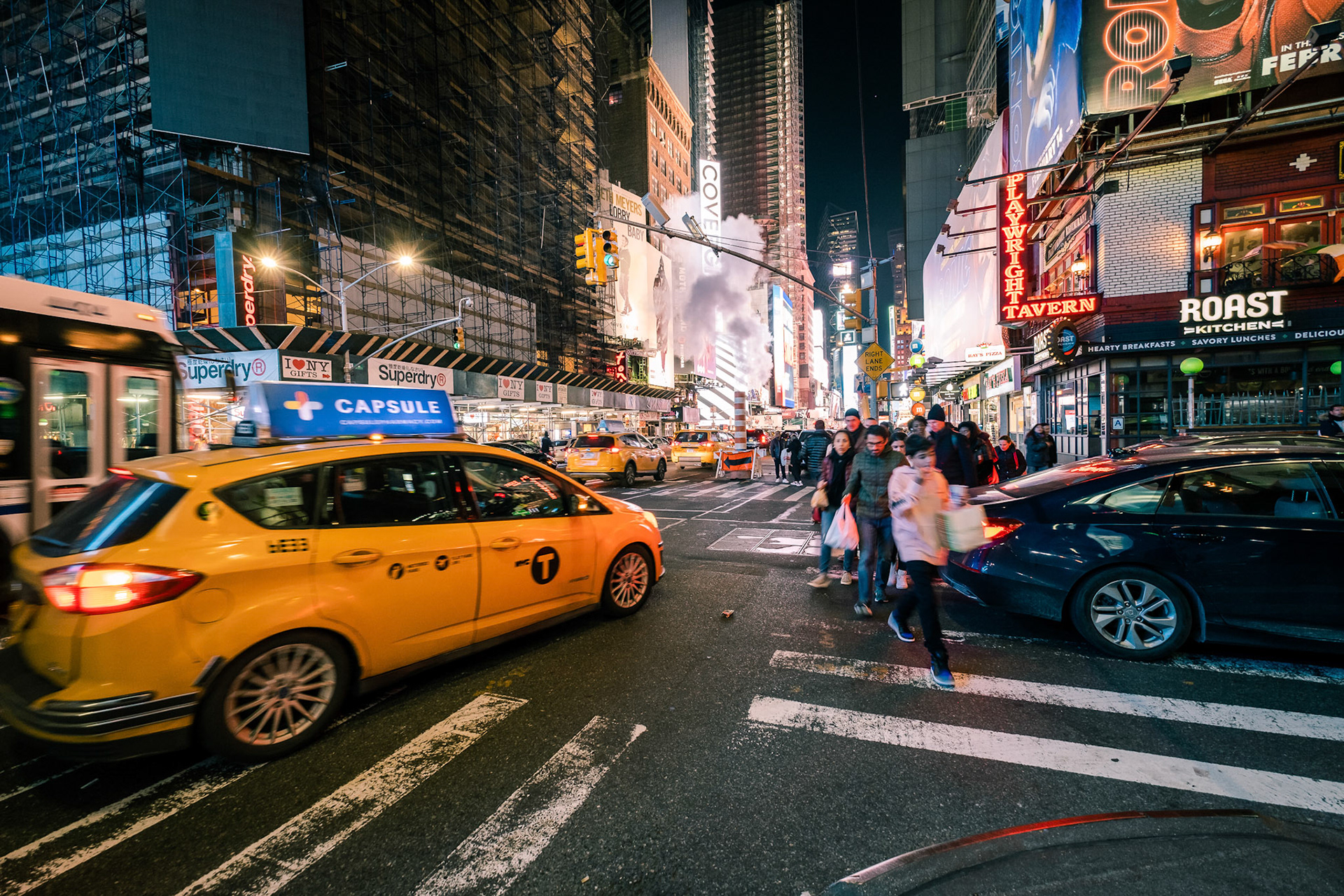New York City street road in Manhattan. Unidentified people on the street. Urban big city life concept background. NEW YORK, USA