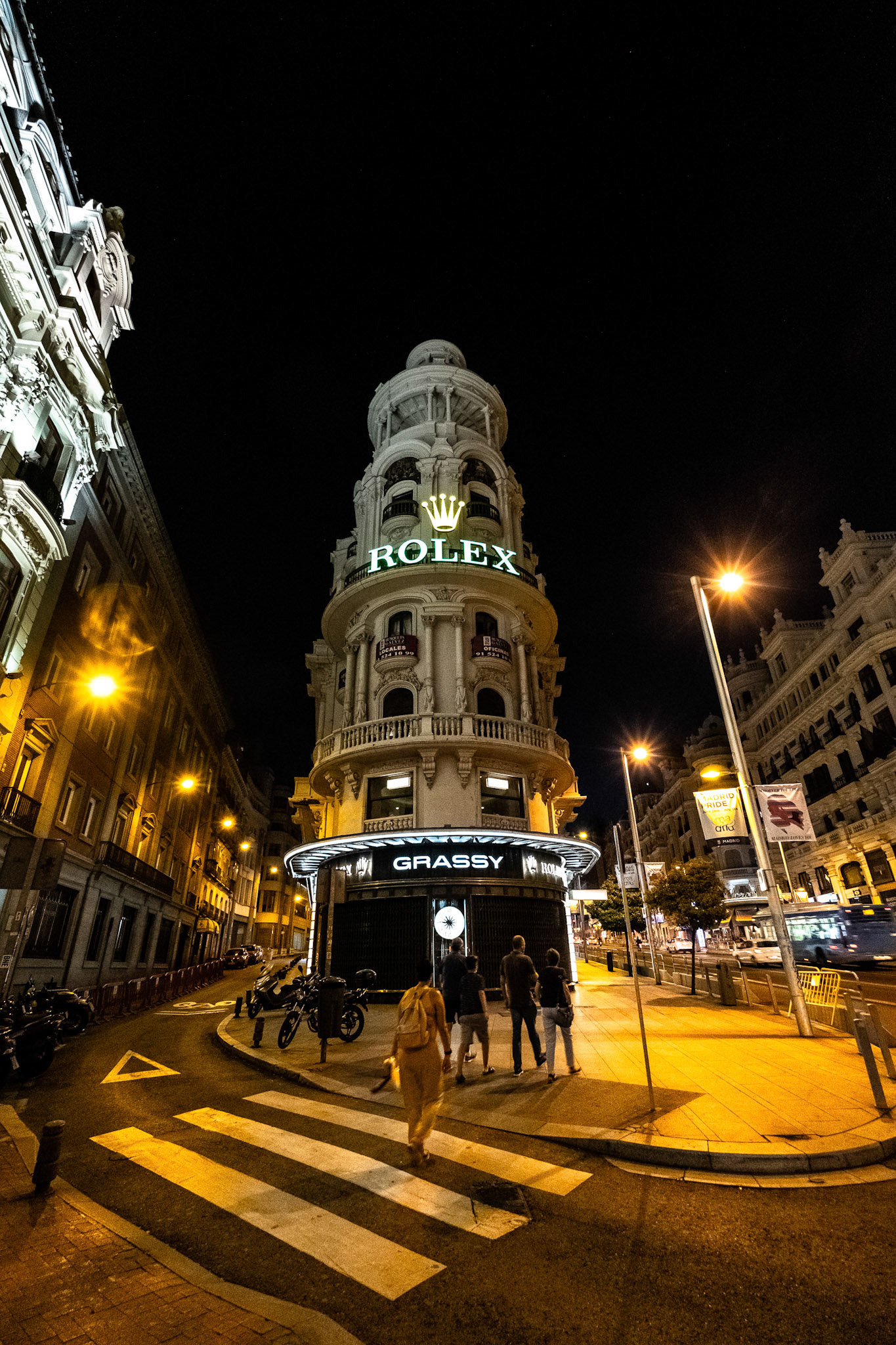 People walking the streets of  Madrid, Spain.