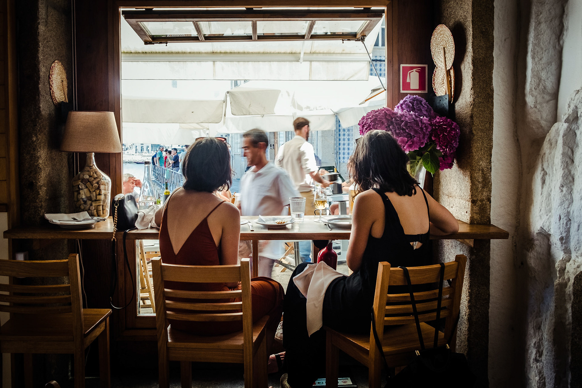 People having lunch in the restaurants of Porto, Portugal.