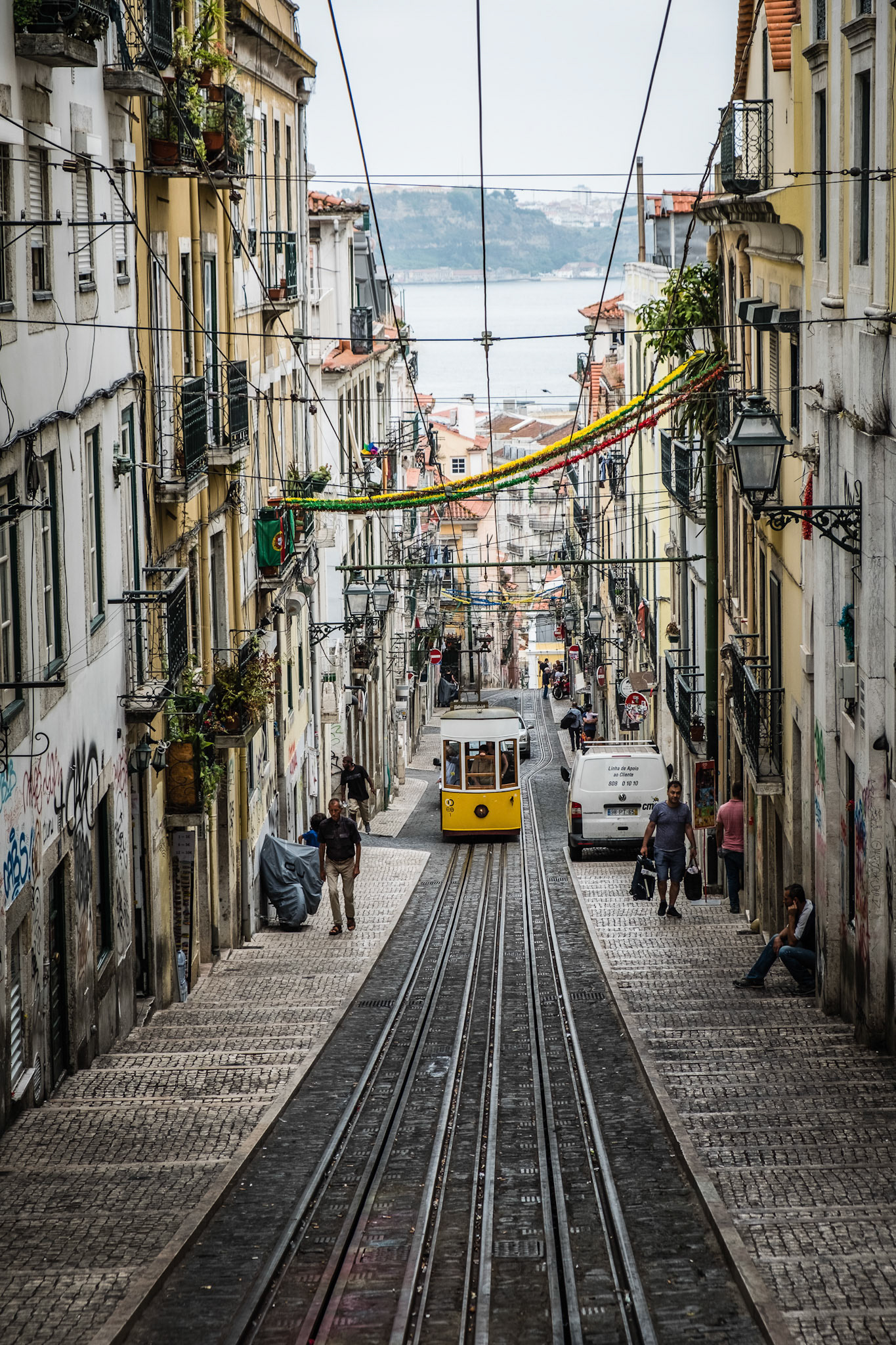 Famous retro yellow tram on the street in Lisbon city, Portugal