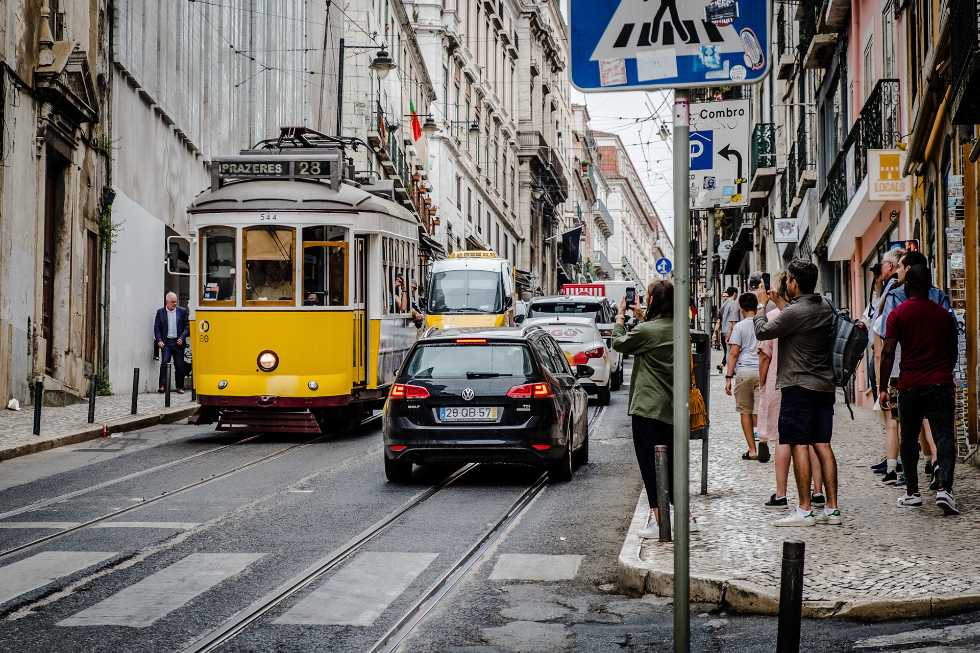 Famous retro yellow tram on the street in Lisbon city, Portugal
