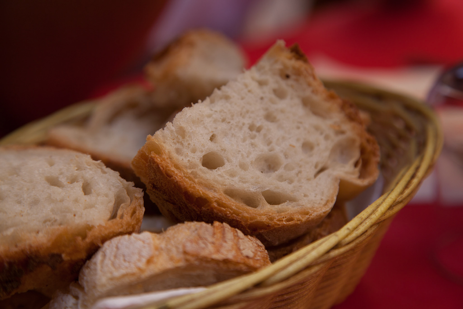assortment of baked bread on wood table