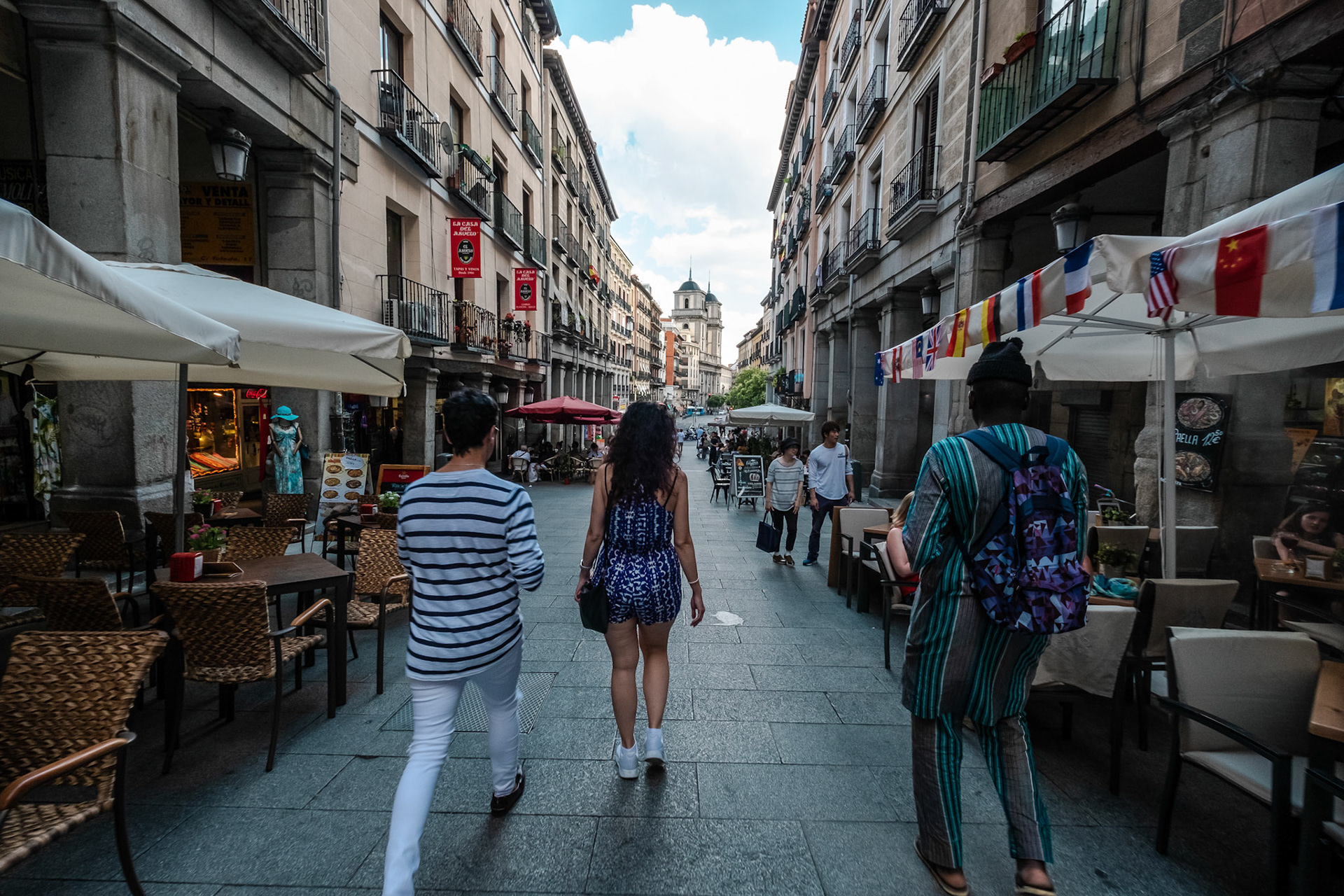 People walking the streets of  Madrid, Spain.