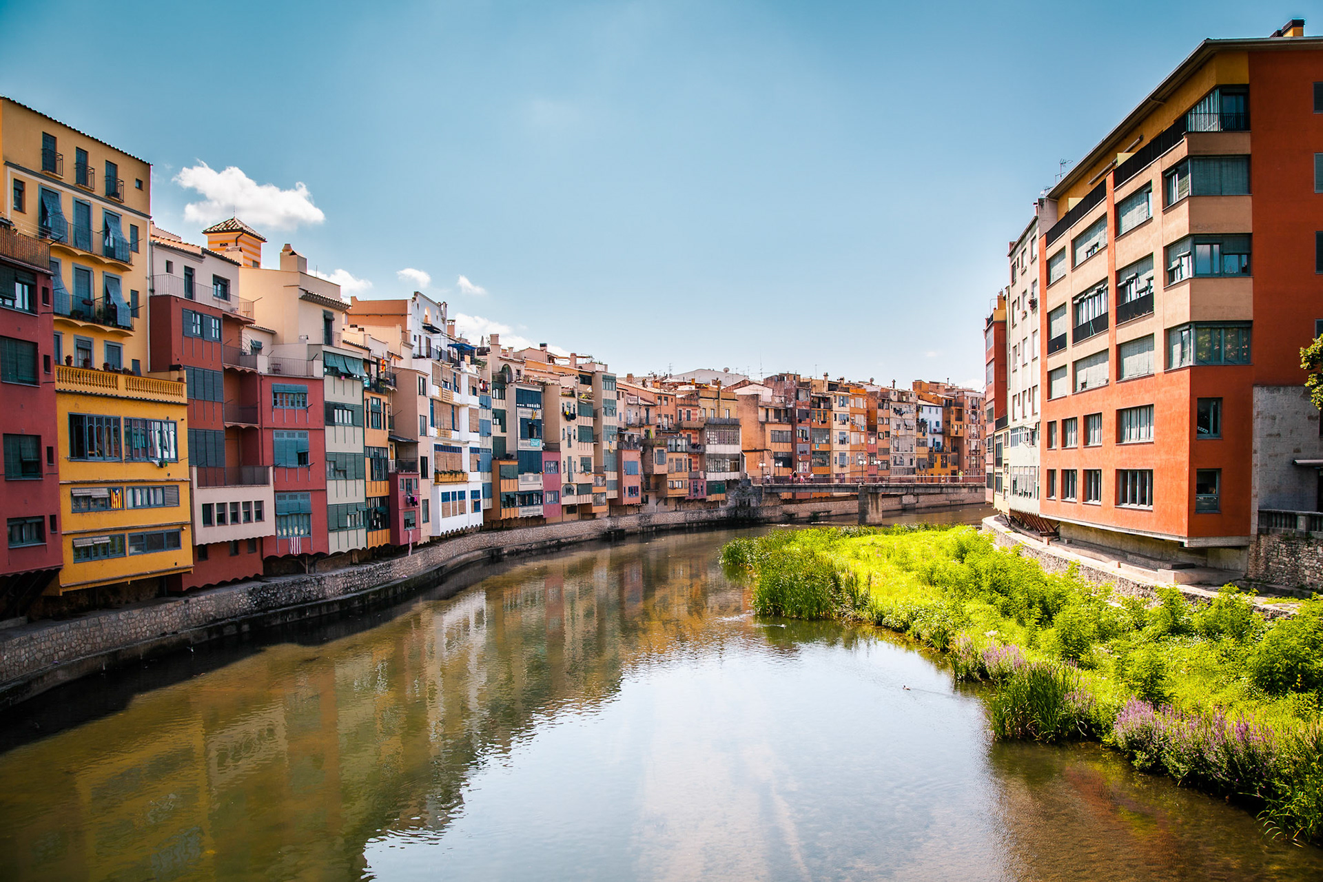 Colorful houses and apartments by the river Onyar in the historic city of Girona, Catalonia, Spain