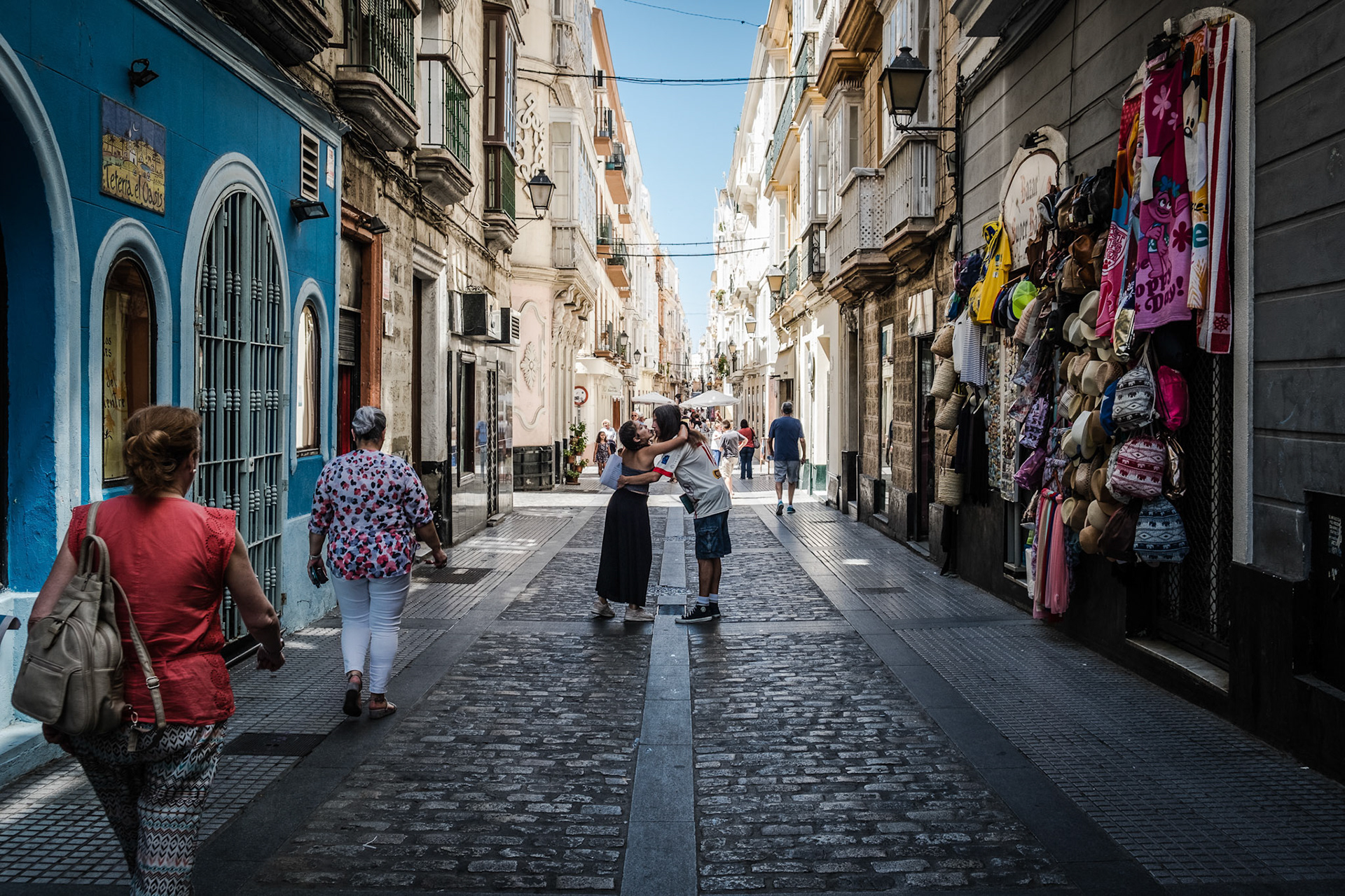 kiss in the middle of a streets at Cadiz, Spain