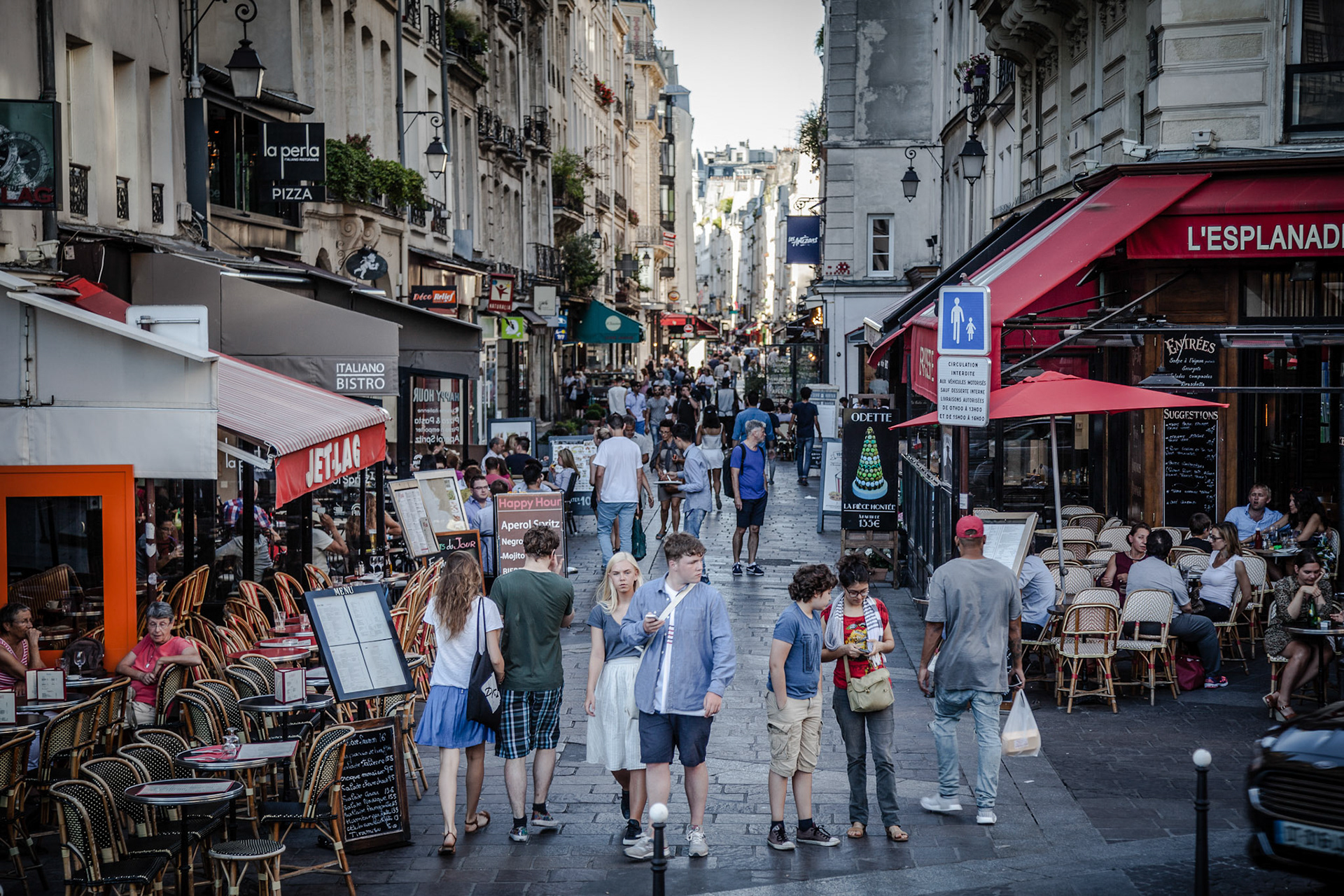 People wlaking in Rue Montorgueil, Paris, France