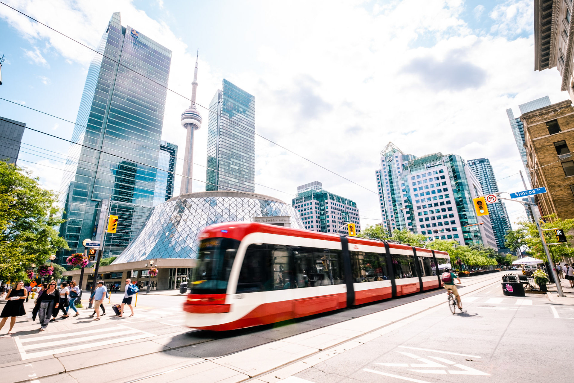 A red tram in downtown Toronto, Canada