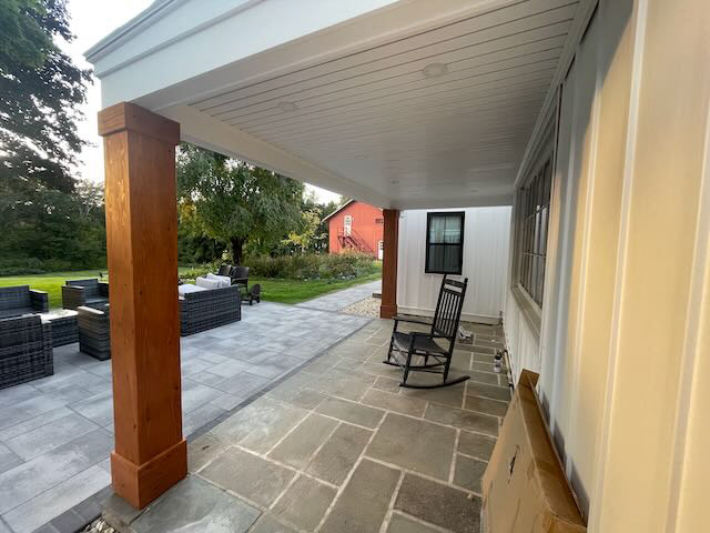 BACK PORCH CEDAR COLUMN WRAPS AND CEILING PANELING - AFTER