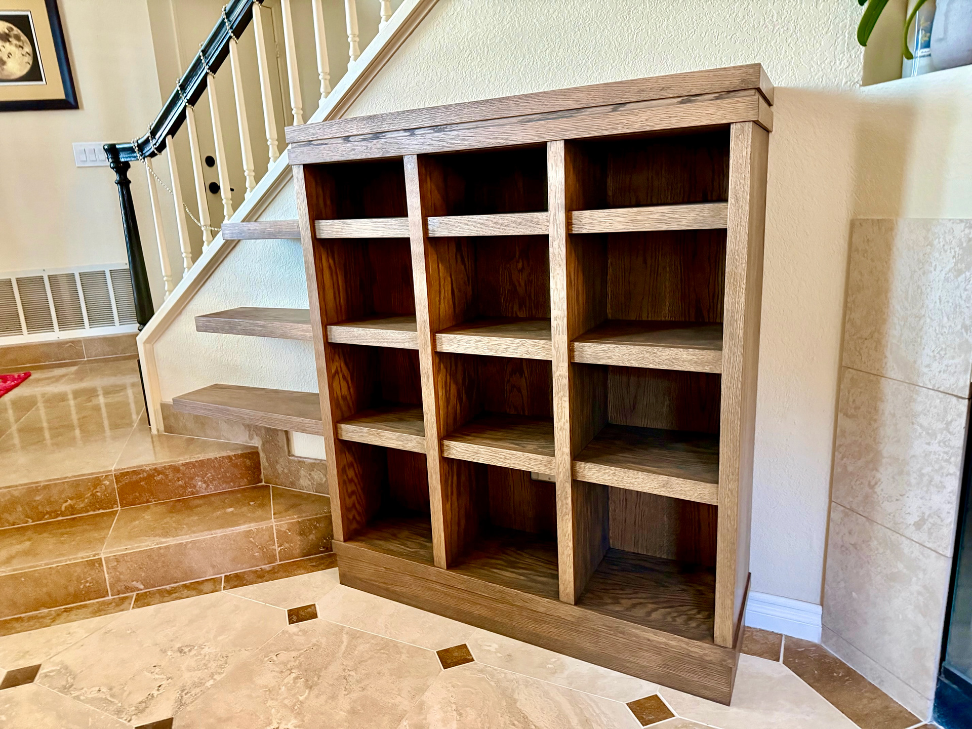 CUSTOM TAPERED BOOK SHELF WITH FLOATING SHELVES