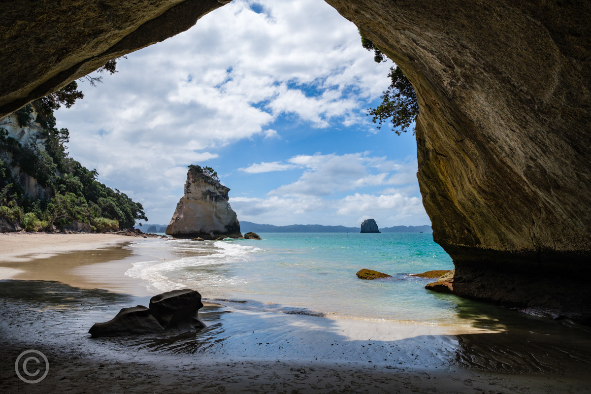 A rare deserted view of Cathedral Cove and Te Hoho Rock, Coromandel Peninsula