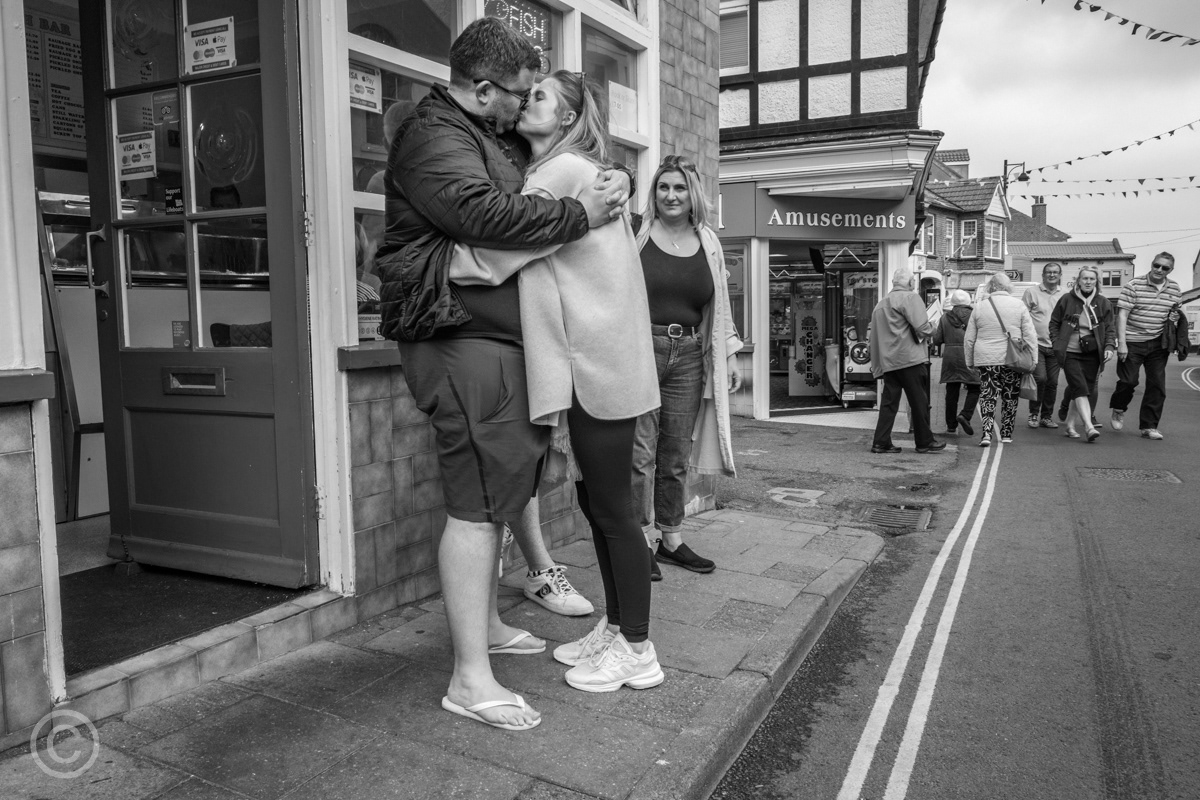 A kiss outside the chip shop, Sheringham, Norfolk