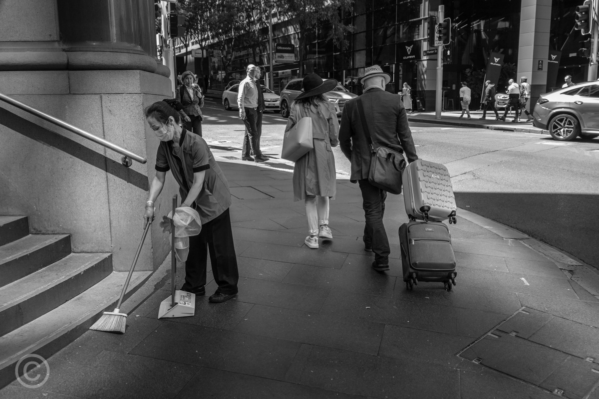 Sweeping the steps, Radisson Plaza Hotel, Sydney, Australia