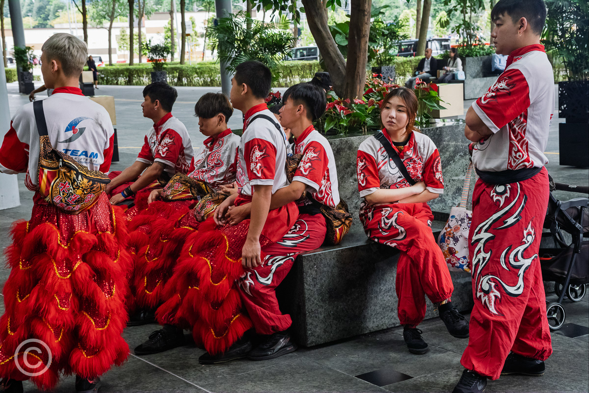 Lion dancers waiting to perform, Singapore