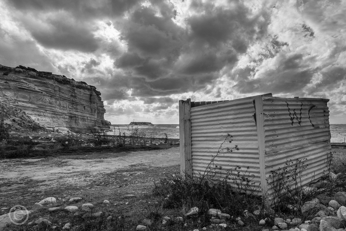 Rustic toilet on beach near Cape Drepano