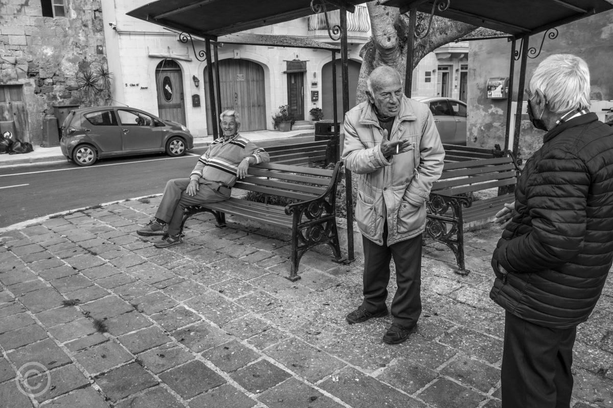 A discussion in the square at Dingli, Malta