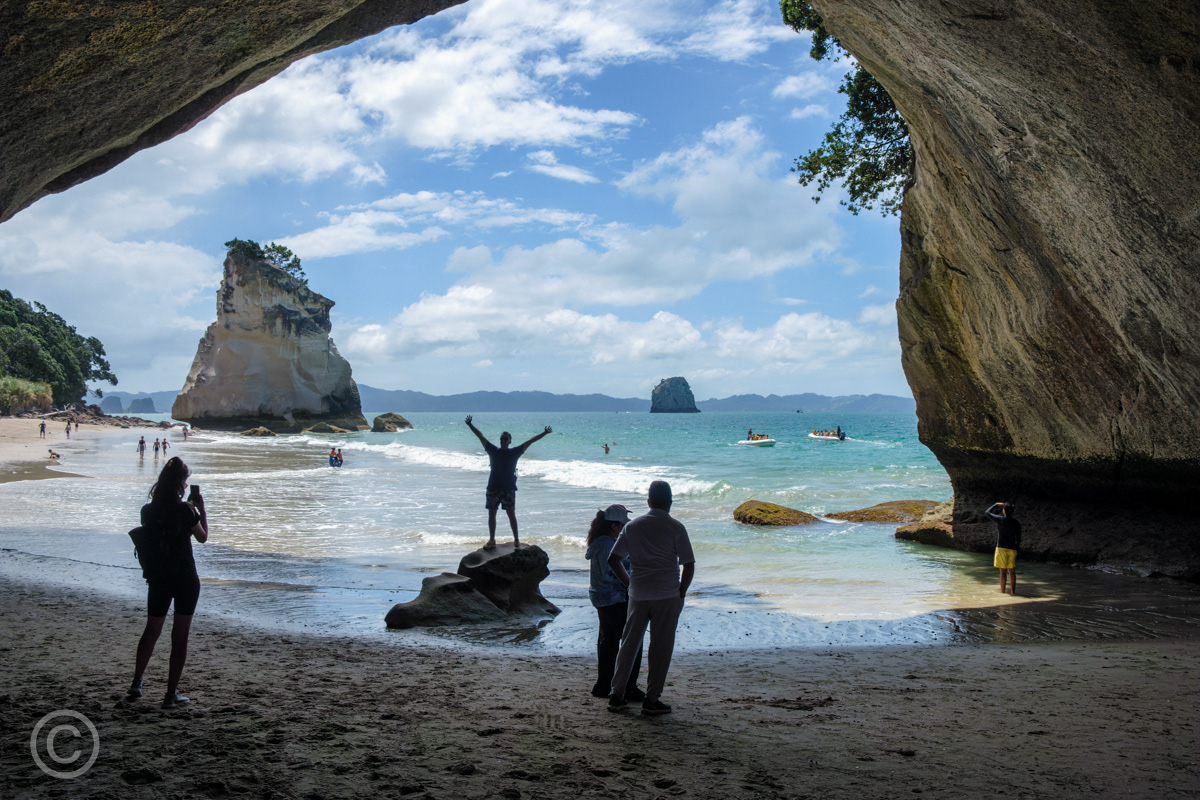 Tourists at Cathedral Cove, Coromandel Peninsula