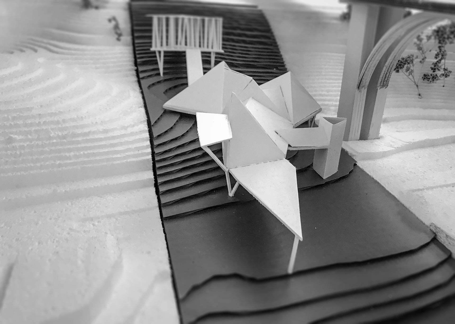 1/16" model showing site topography and surrounding conditions.