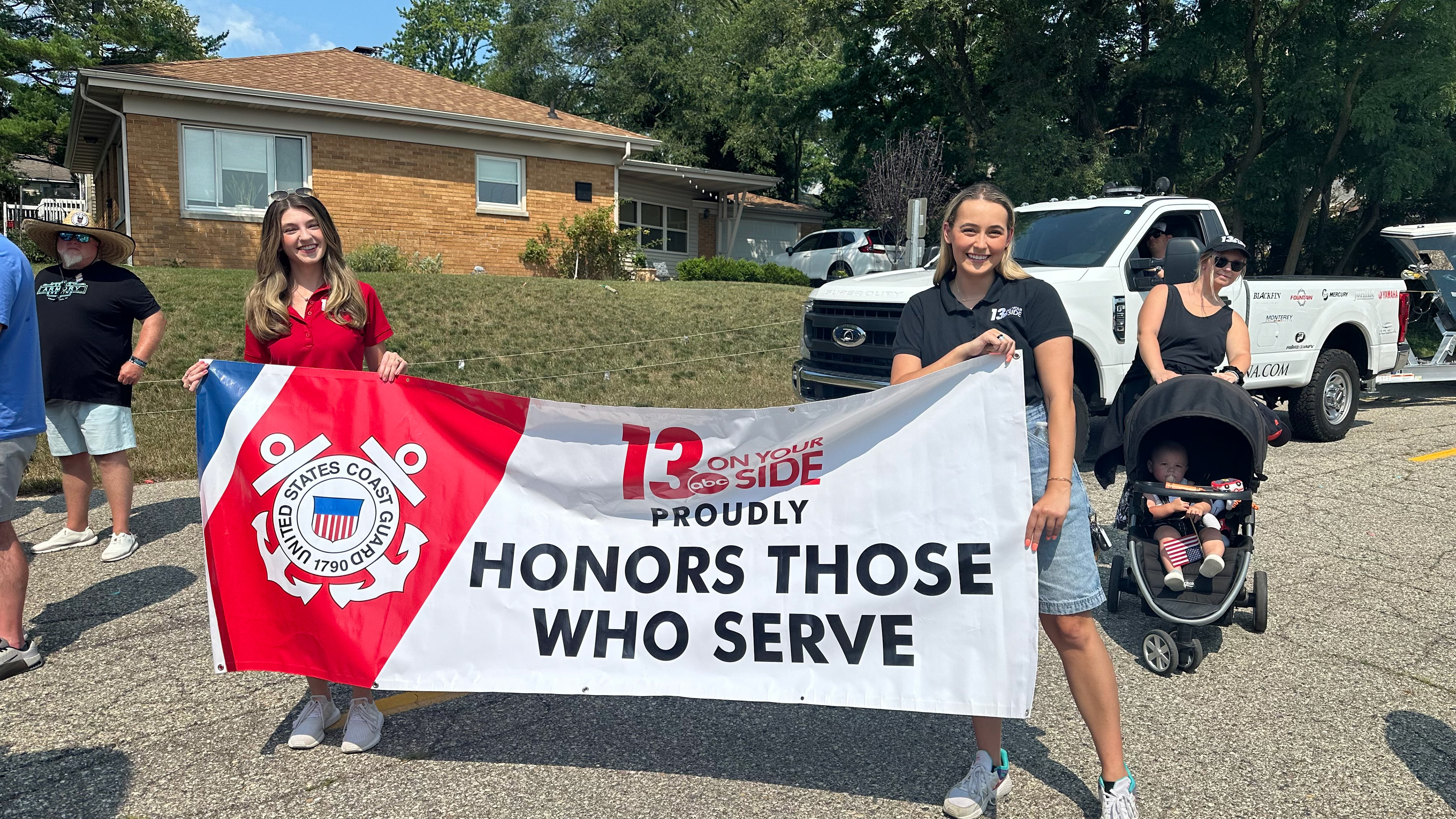 Carrying the banner at the Coast Guard Parade