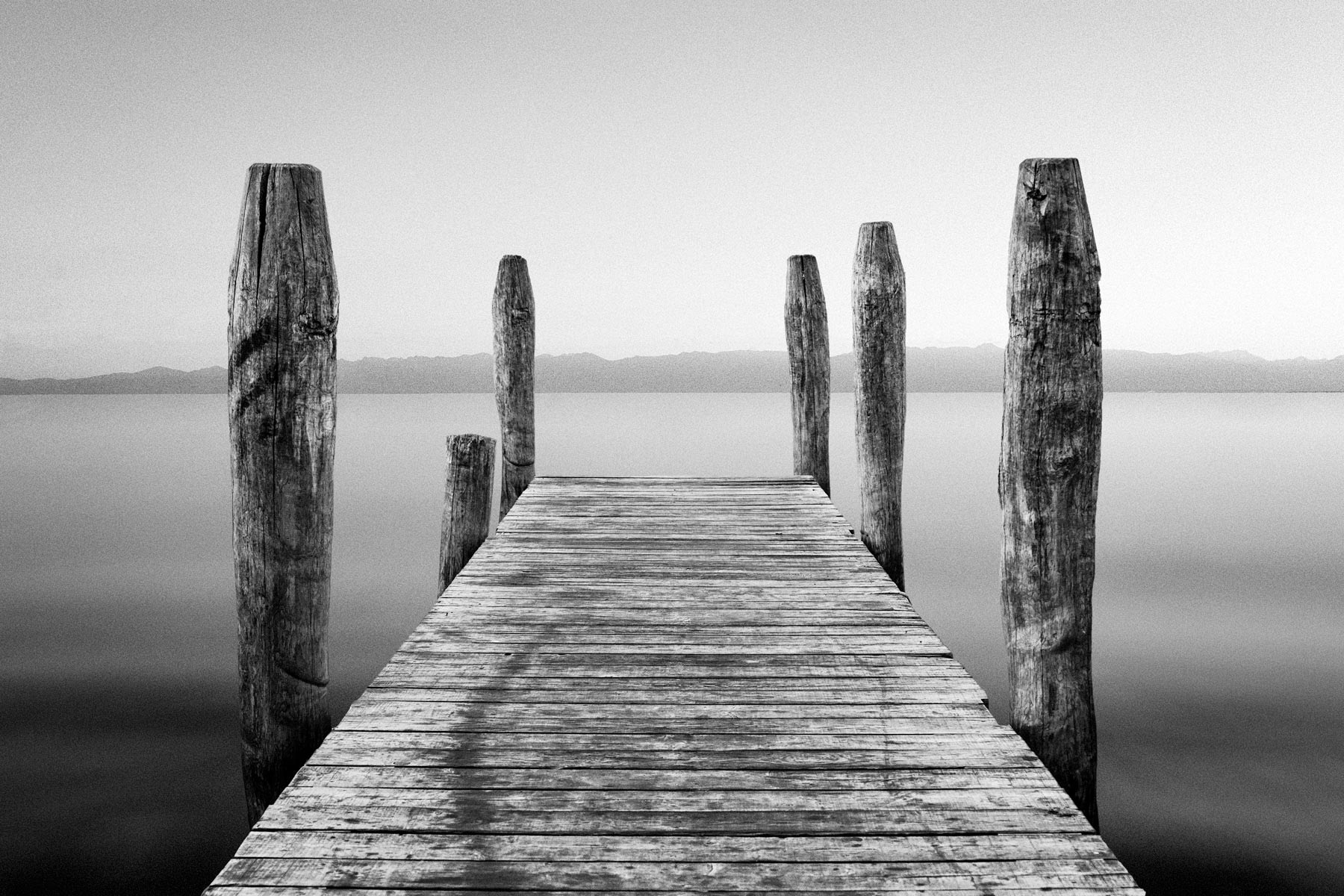 Wooden dock in the mist