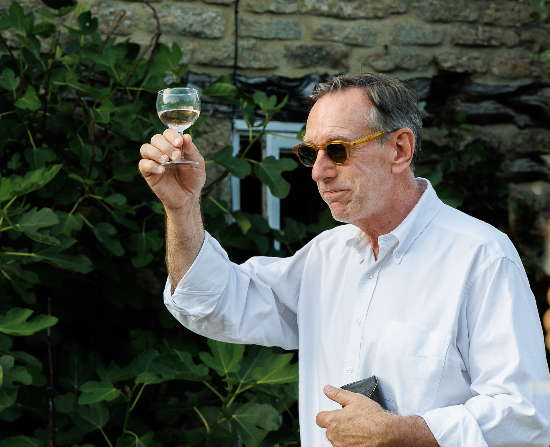 Tom raises a glass to Sophie, Angela and Stephen