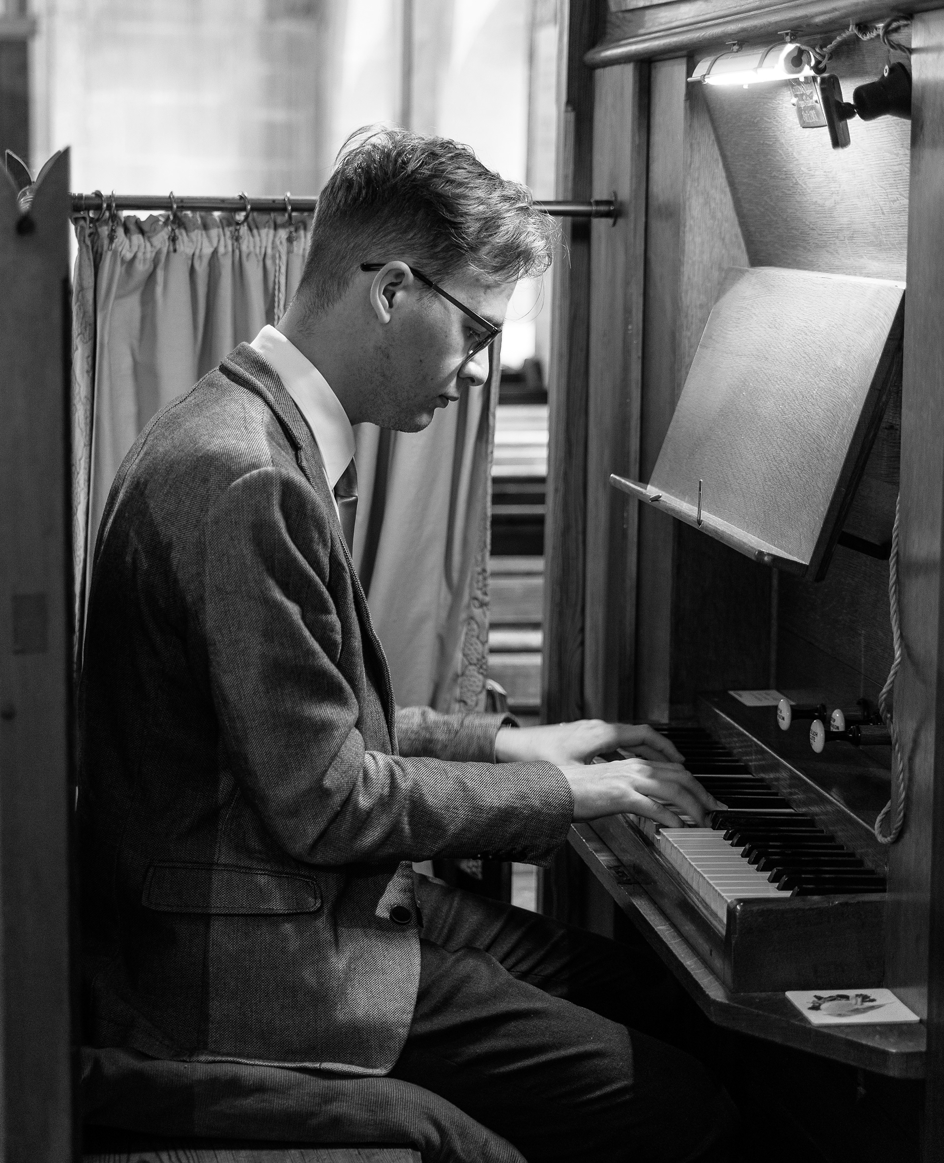 Benedek plays the organ