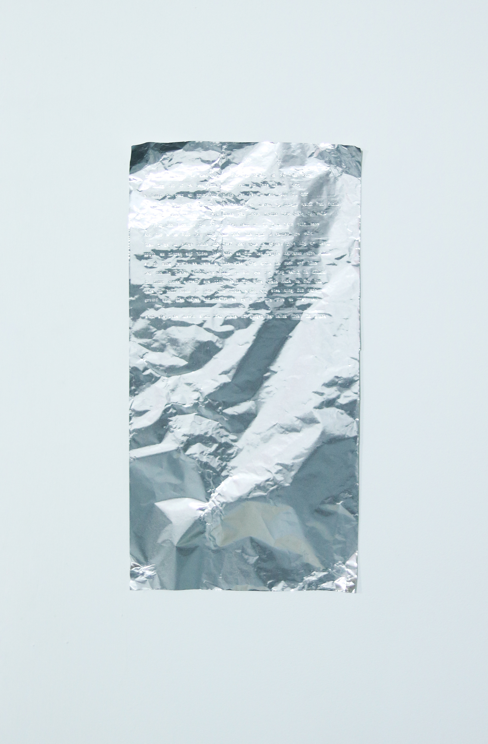 toblerone poem on aluminium foil, 15x15 syllables