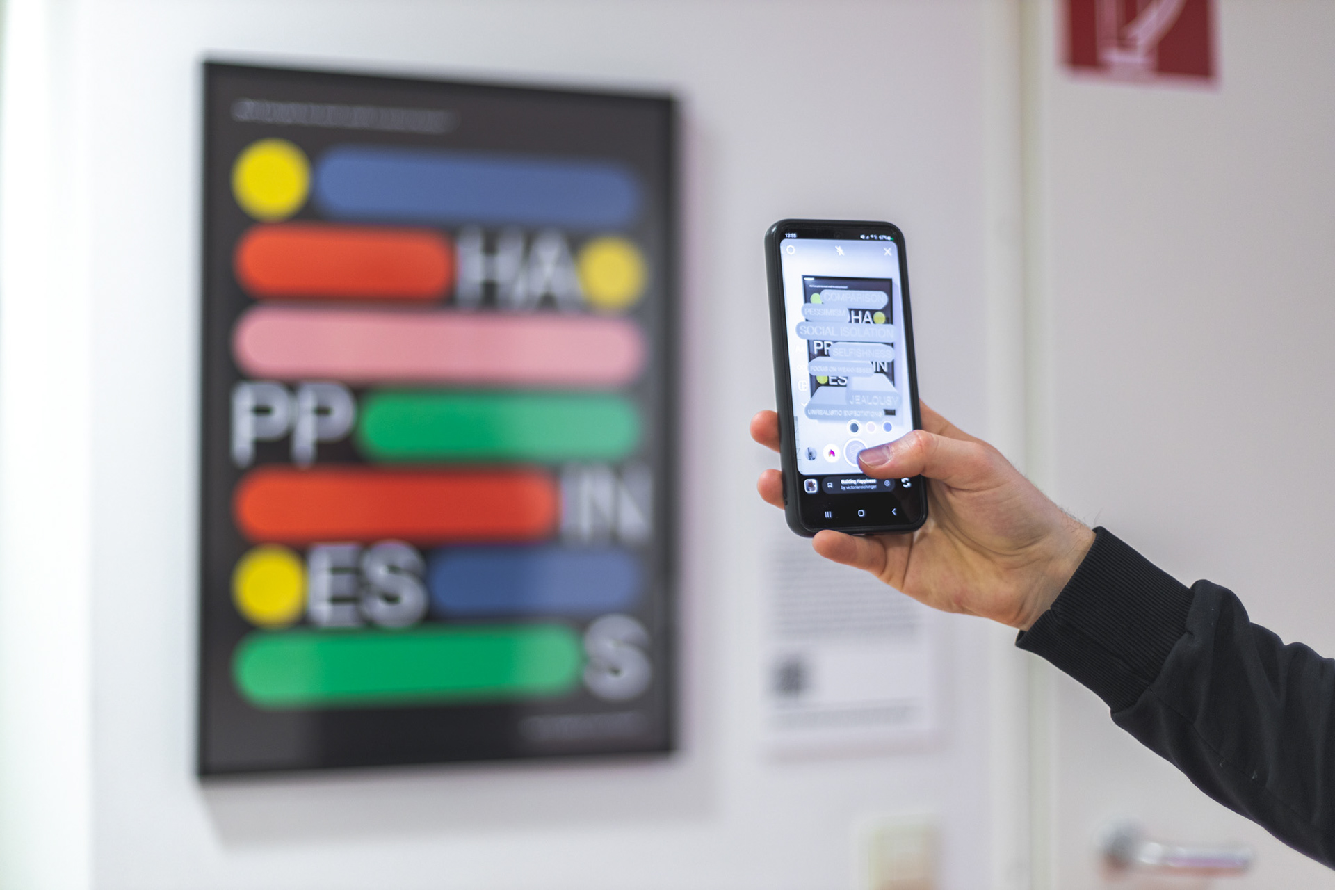 3D extension of the poster appears on phone