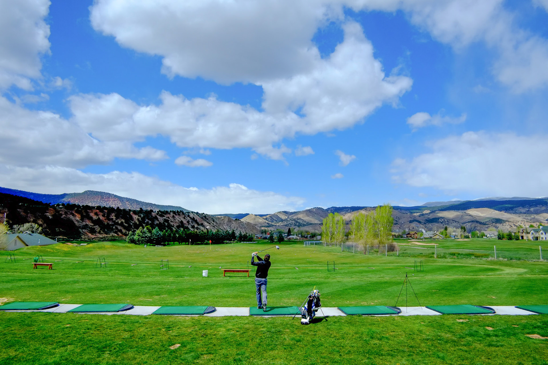 Todd Grant, of Vail, practices at the Gypsum Creek driving range on Tuesday. Local courses are beginning to open up and many golfers have been found braving the recent chilly and wet weather.