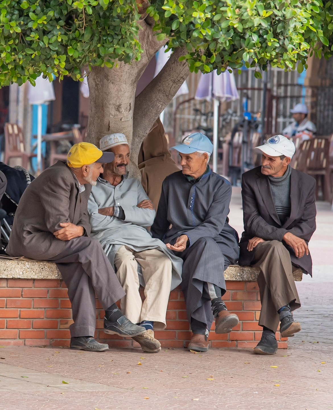 Men in conversation in the square in Taroudant