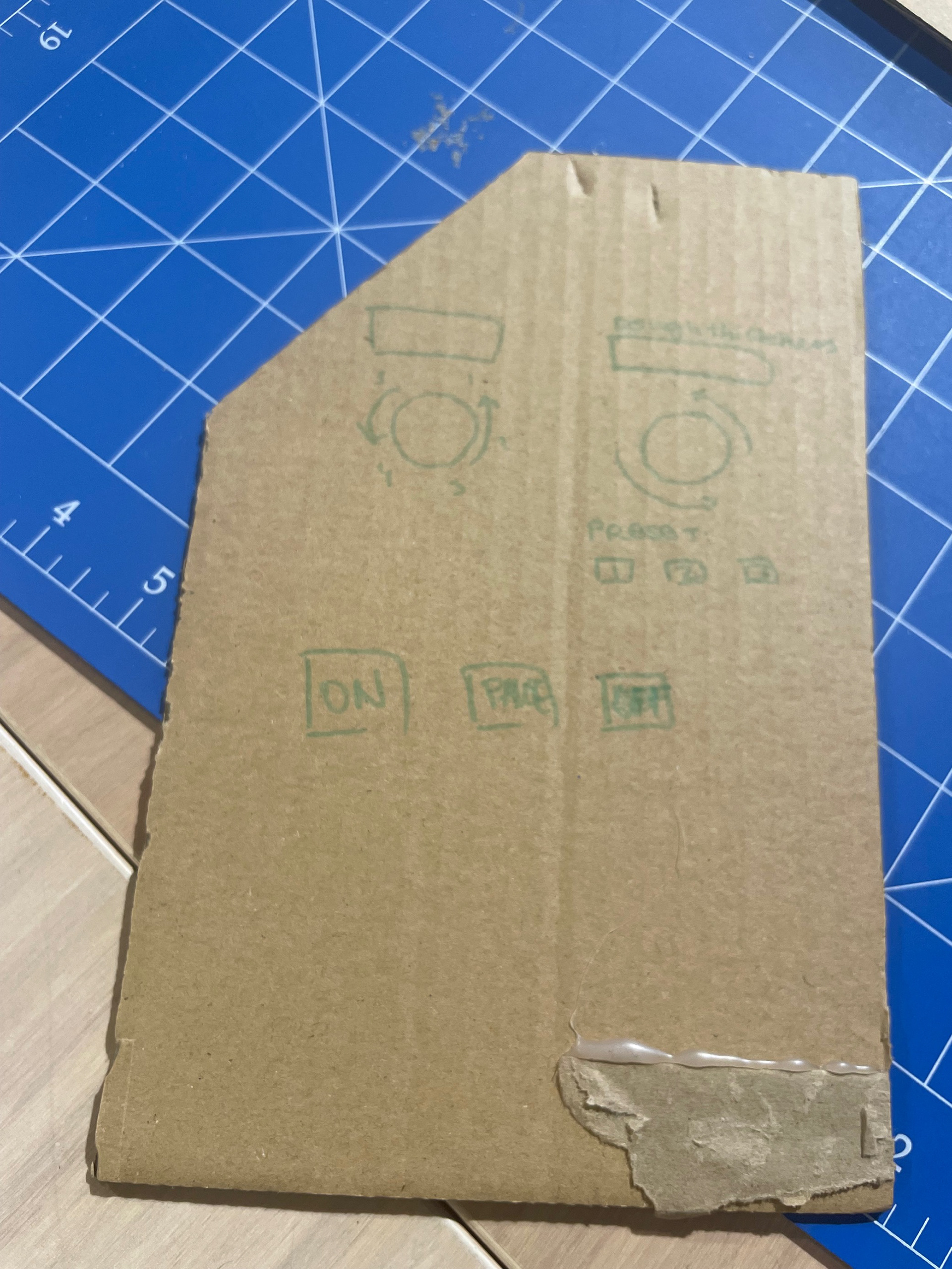 Universal Design in the Kitchen, Domestic Dough Sheeter User-Interface Prototype. Created with cardboard, masking tape, popsticks and paper.