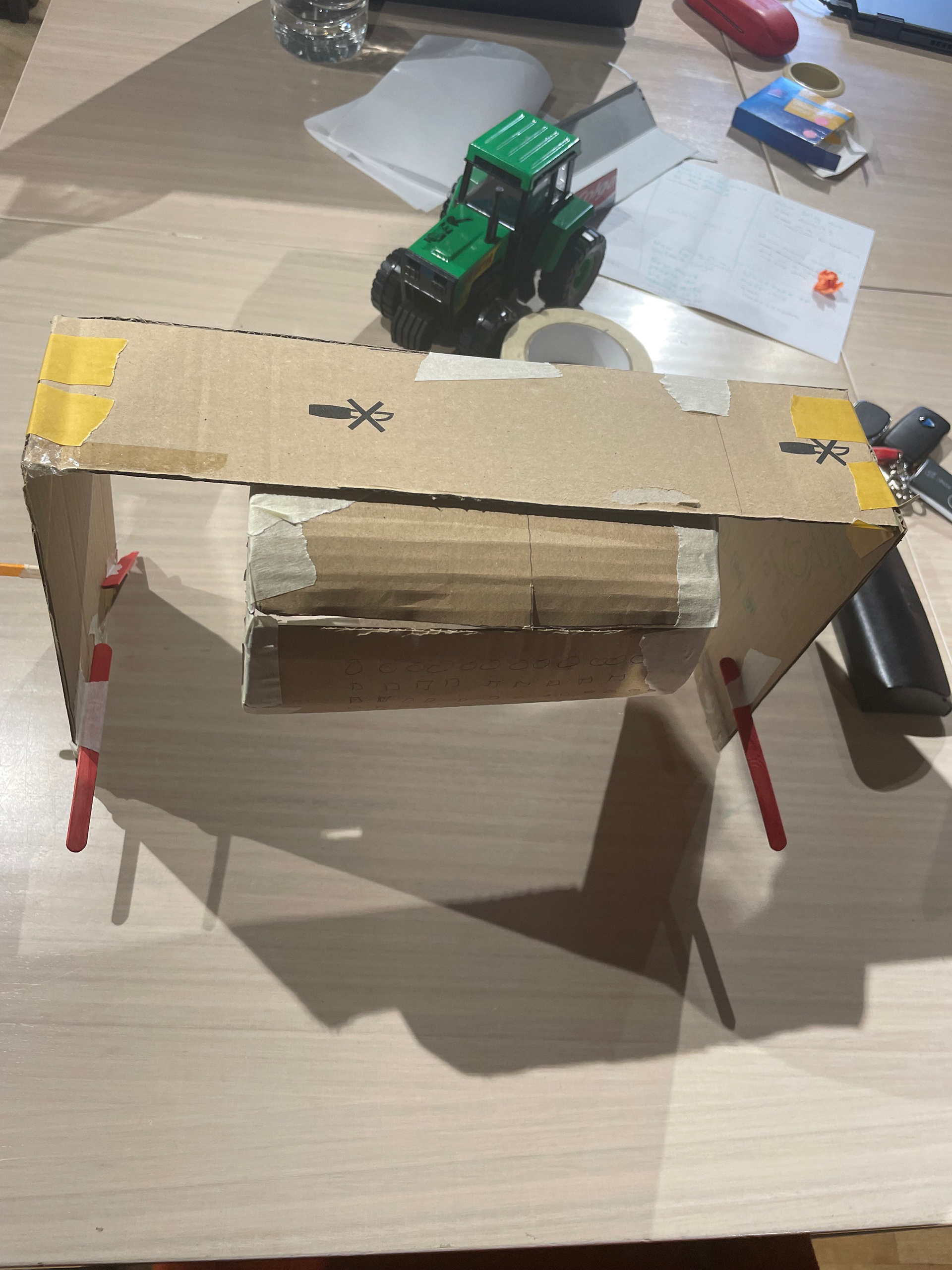Universal Design in the Kitchen, Domestic Dough Sheeter Prototype. Created with cardboard, masking tape, popsticks and paper. Above veiw.