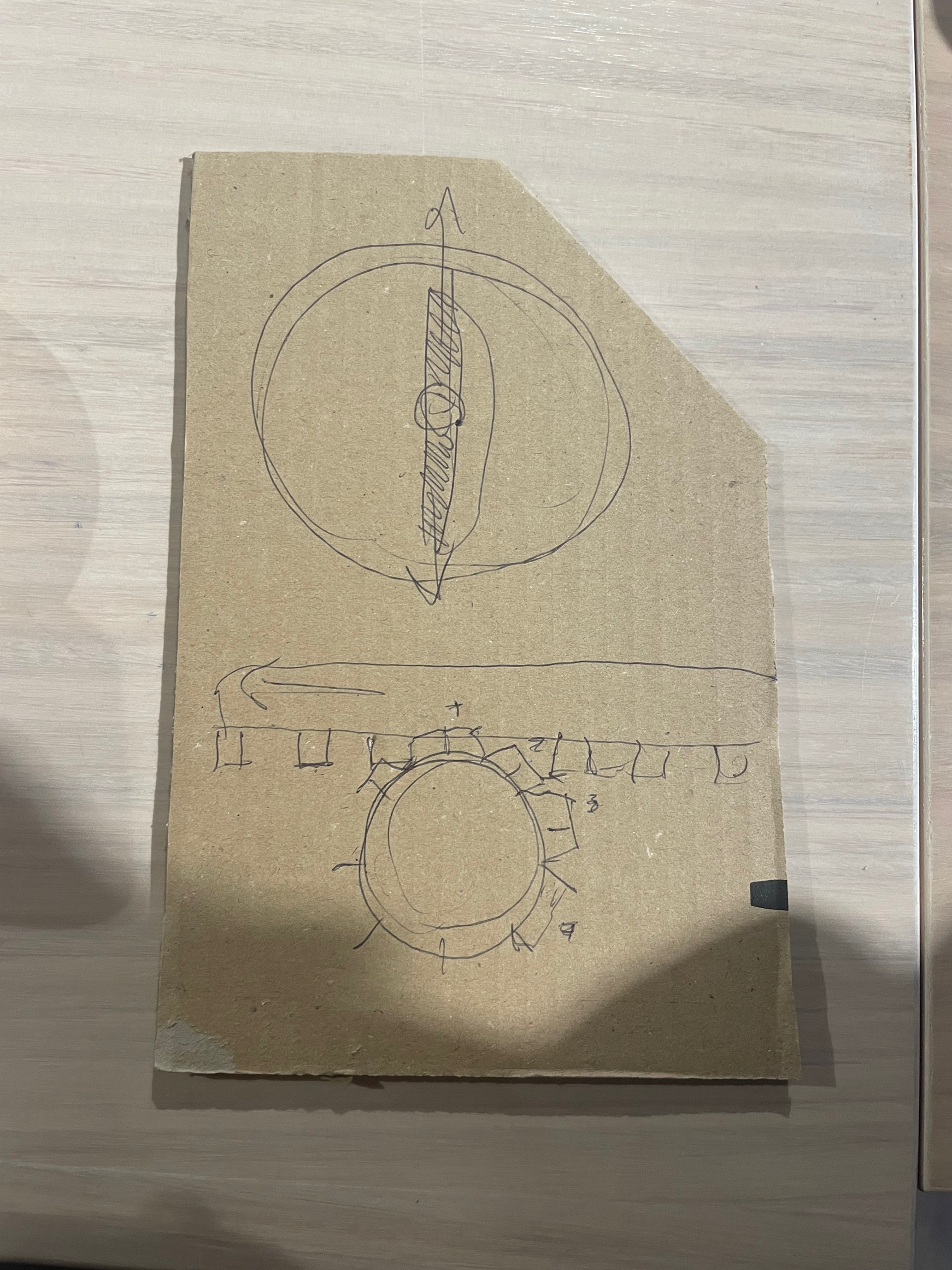 Universal Design in the Kitchen, Domestic Dough Sheeter Internal Interface Prototype. Created with cardboard, masking tape, popsticks and paper.