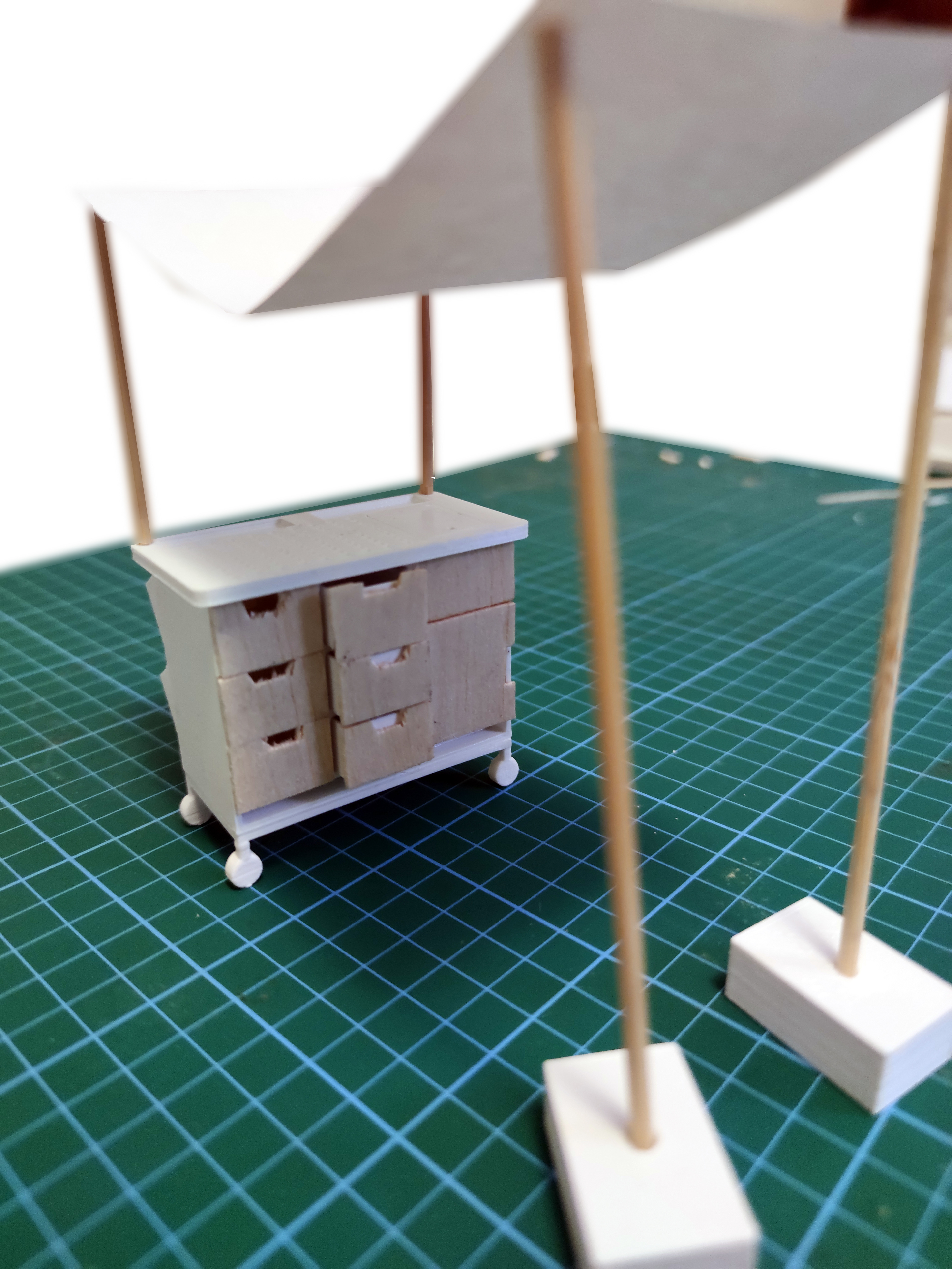 The STEAM Learning Pod, showing open drawers and outdoor context with portable tent covering.