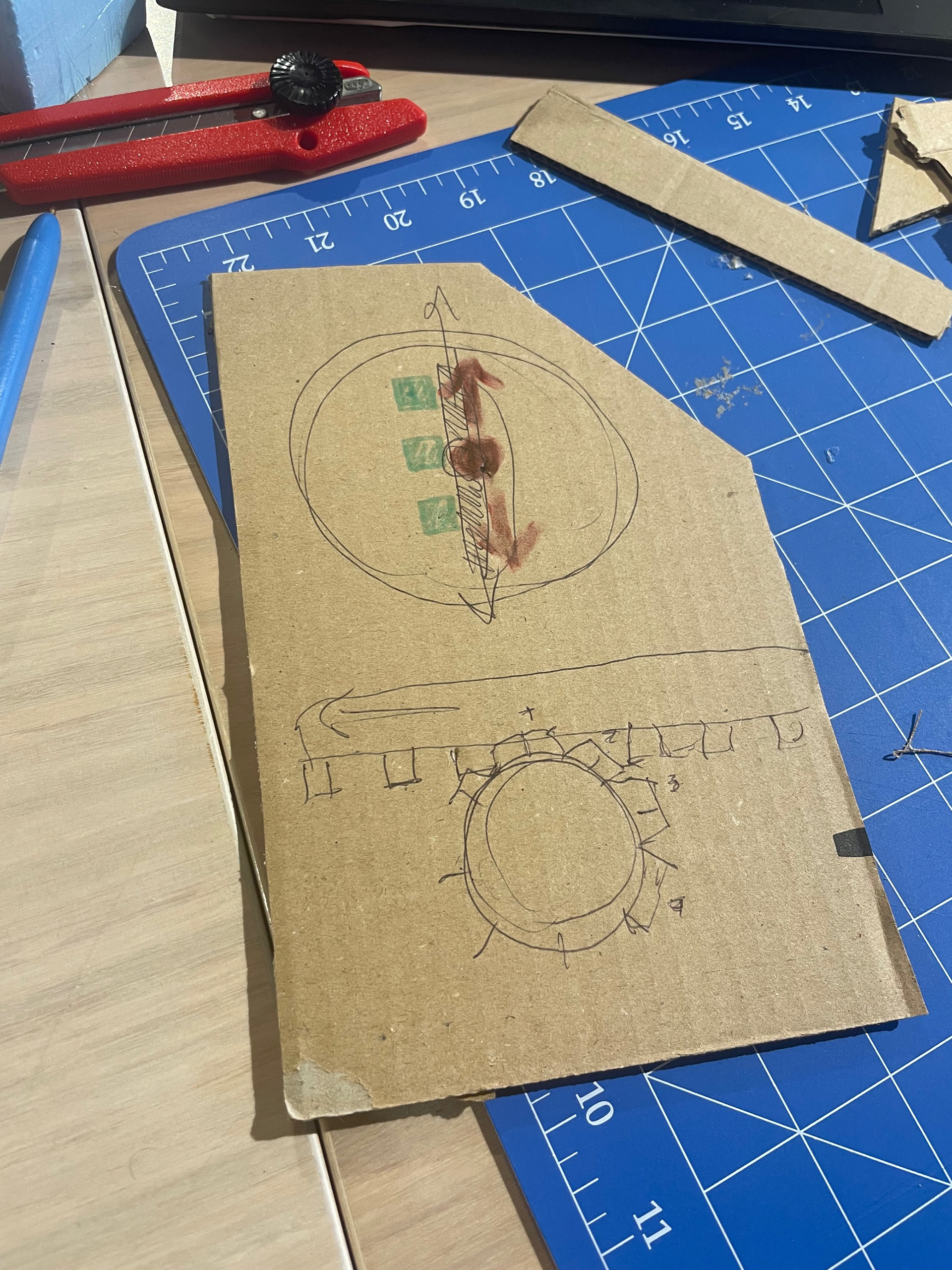Universal Design in the Kitchen, Domestic Dough Sheeter User-Interface Prototype. Created with cardboard, masking tape, popsticks and paper.