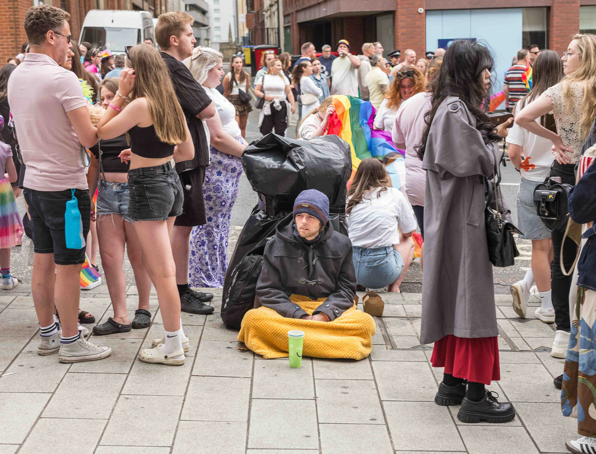 Man Sat at Pride Parade - Leeds UK 2024