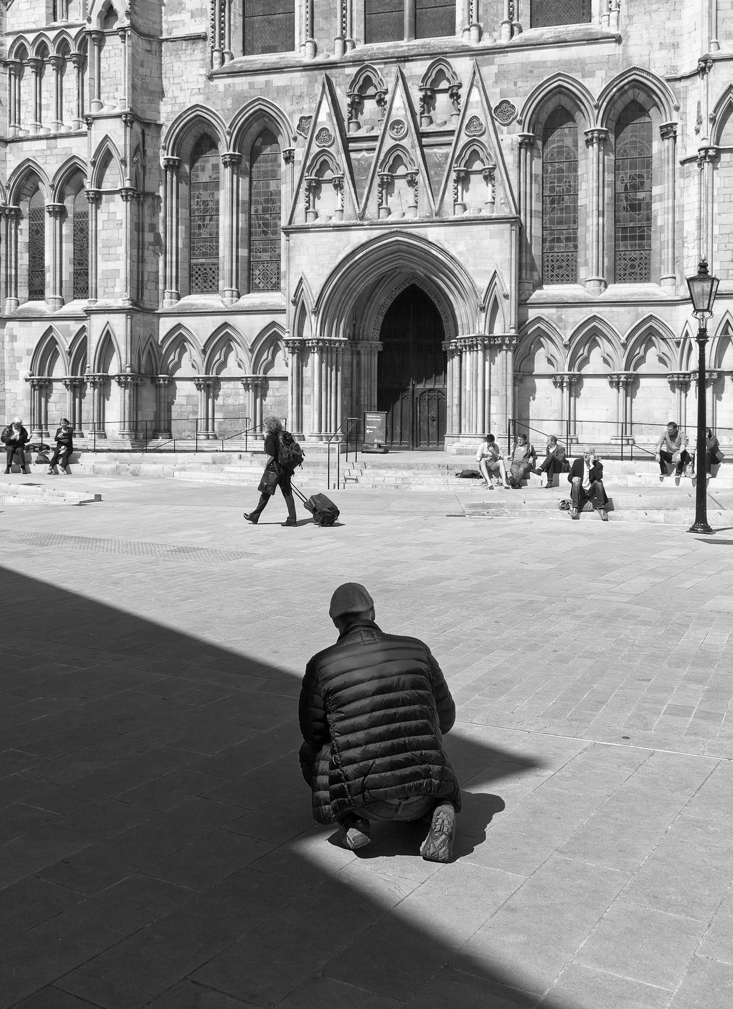 Man Kneeling - Outside York Minster North Yorkshire UK