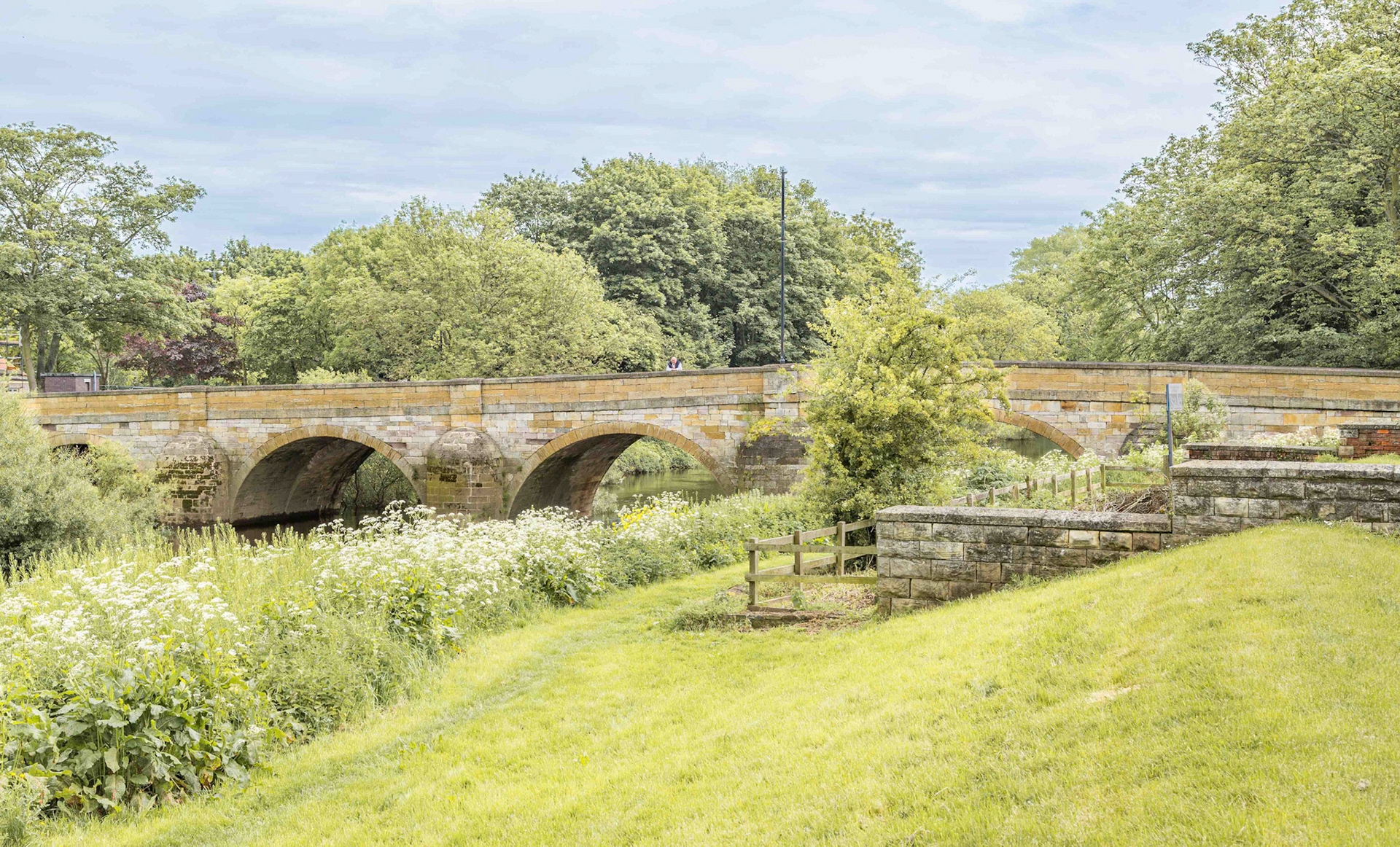 Man Fishing at Tadcaster Bridge - West Yorkshire UK