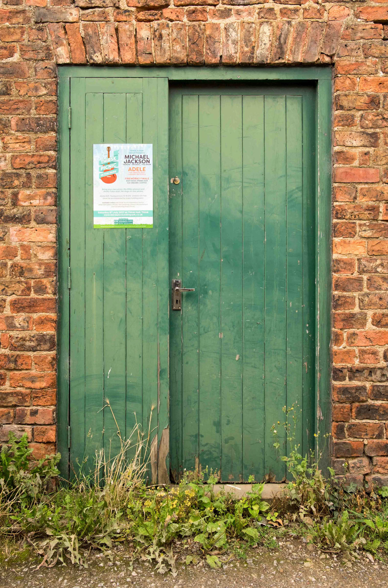 Old Door with Adele and Michael Jackson Poster - Thirsk North Yorkshire UK 2017