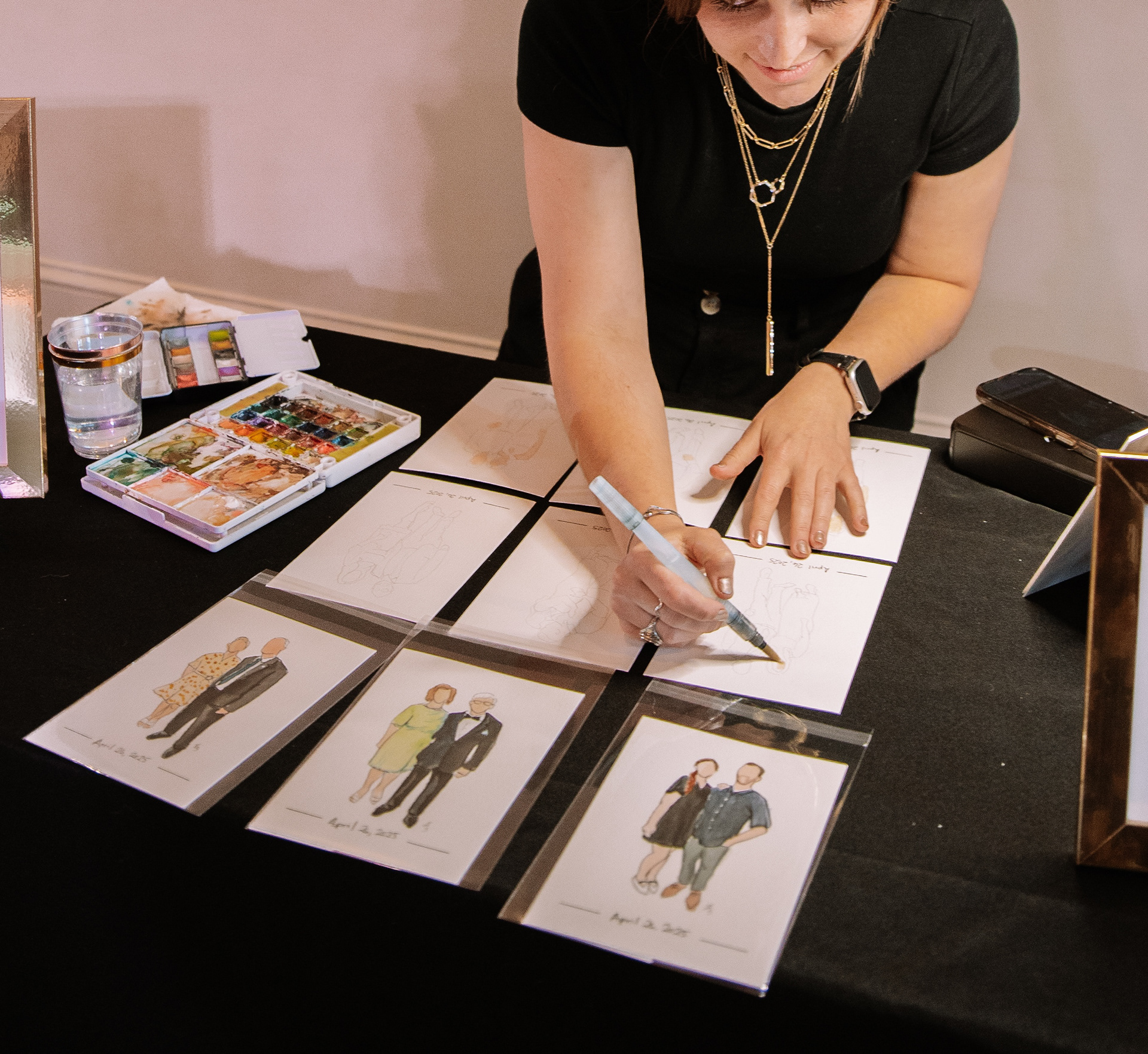 Painter painting small watercolors