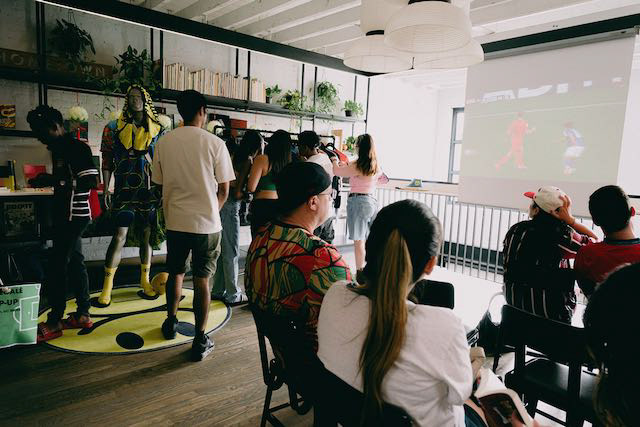 Projector to show World Cup games while other guests shop