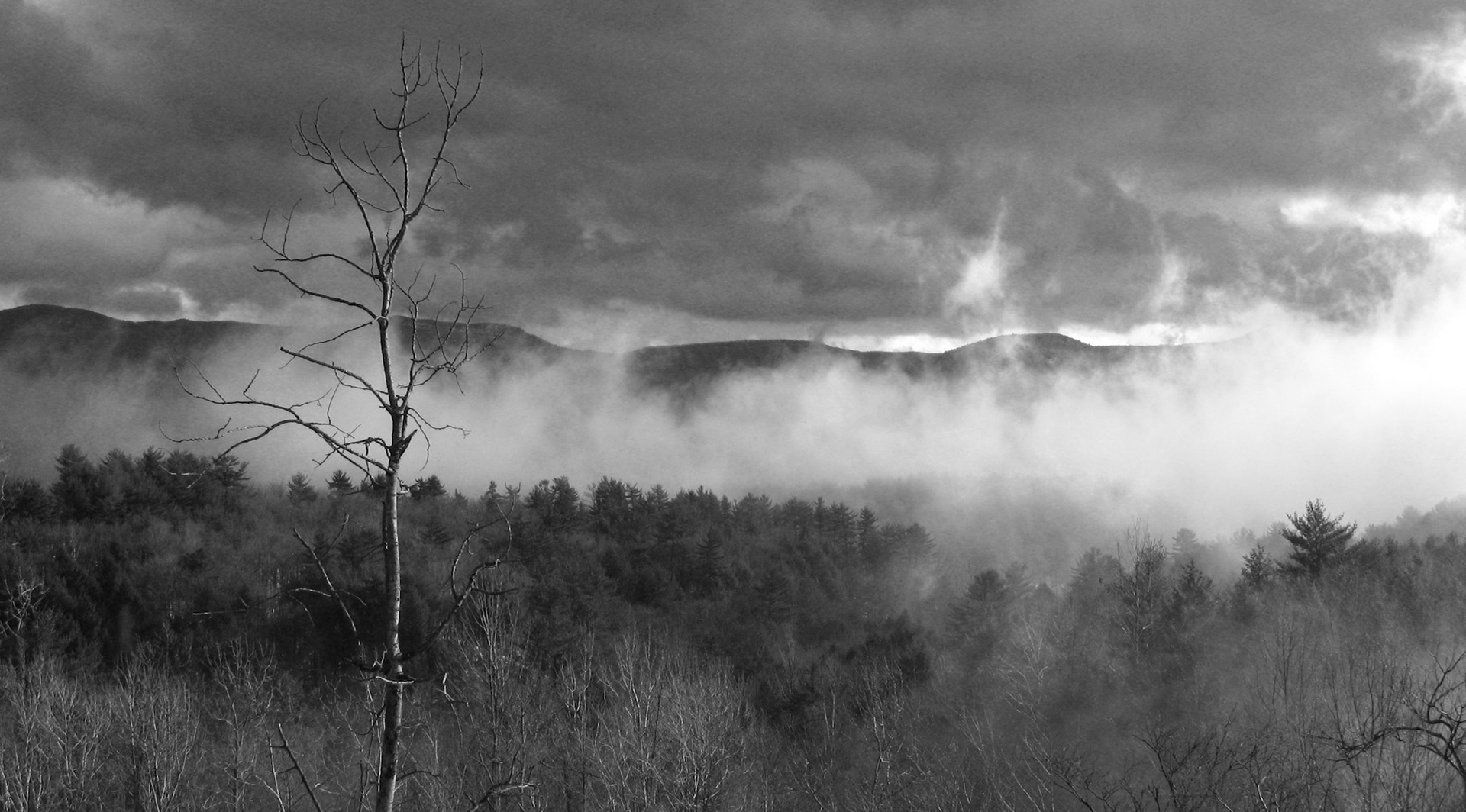 Fog lifts over Bolton Landing and Lake George