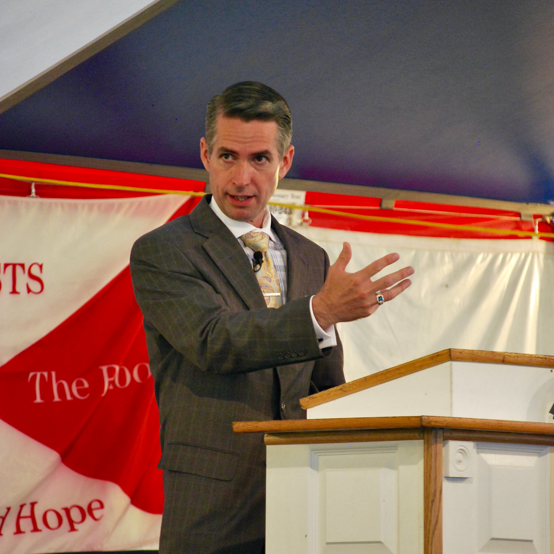Pastor Matthew LaFave preaching during a Tent Revival